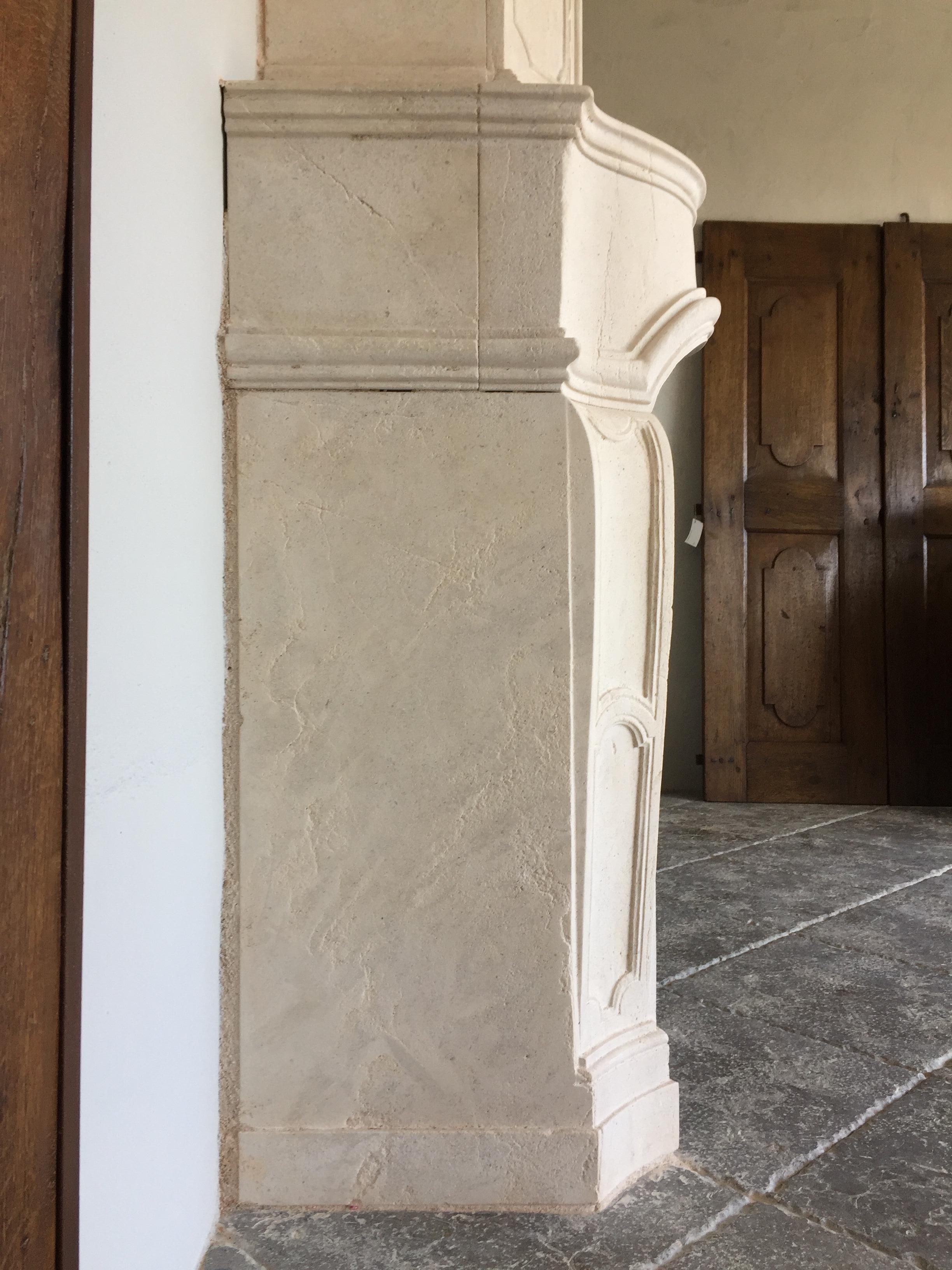 Late 20th century Re-edition Louis XIV style fireplace aged limestone For Sale 1
