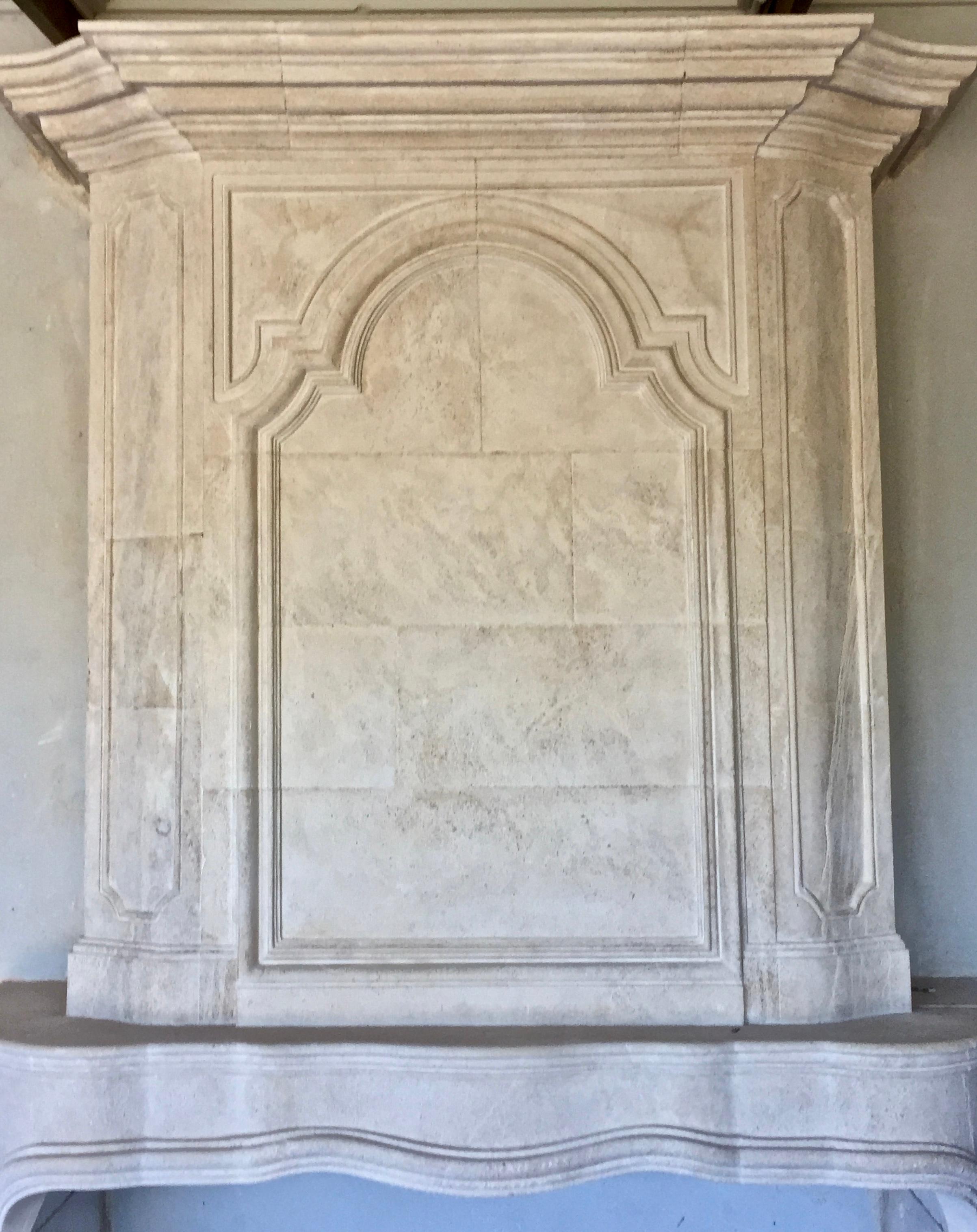 Late 20th century Re-edition Louis XIV style fireplace aged limestone For Sale 2