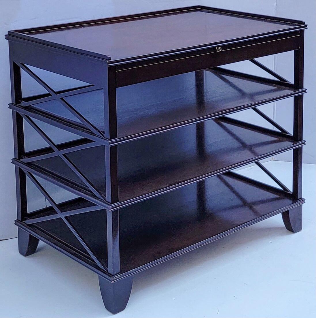 This is a Rose Tarlow mahogany multi-tiered server or side table. It has a slim drawer and pull out shelf. It is marked and in very good condition.