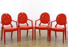 Late 20th Century Set of Four Philippe Starck Style Red Molded Plastic Armchairs