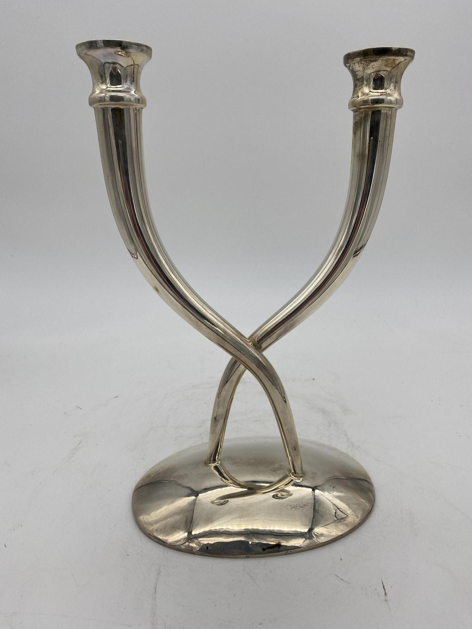 Late 20th Century sterling silver candle holder pair featuring 2 double arms on each holder with free-form base. Stamped: Sterling Silver Villa Circa 1980 Candle Stick: 12.5