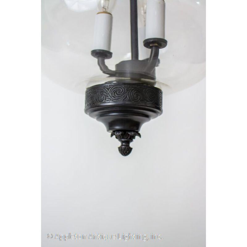 Late 20th century Traditional bell jar Lantern. Bell jar lanterns first reached popularity in colonial India and due to their lingering popularity, production has continued to the present. The glass disk at the top was originally to catch smoke from