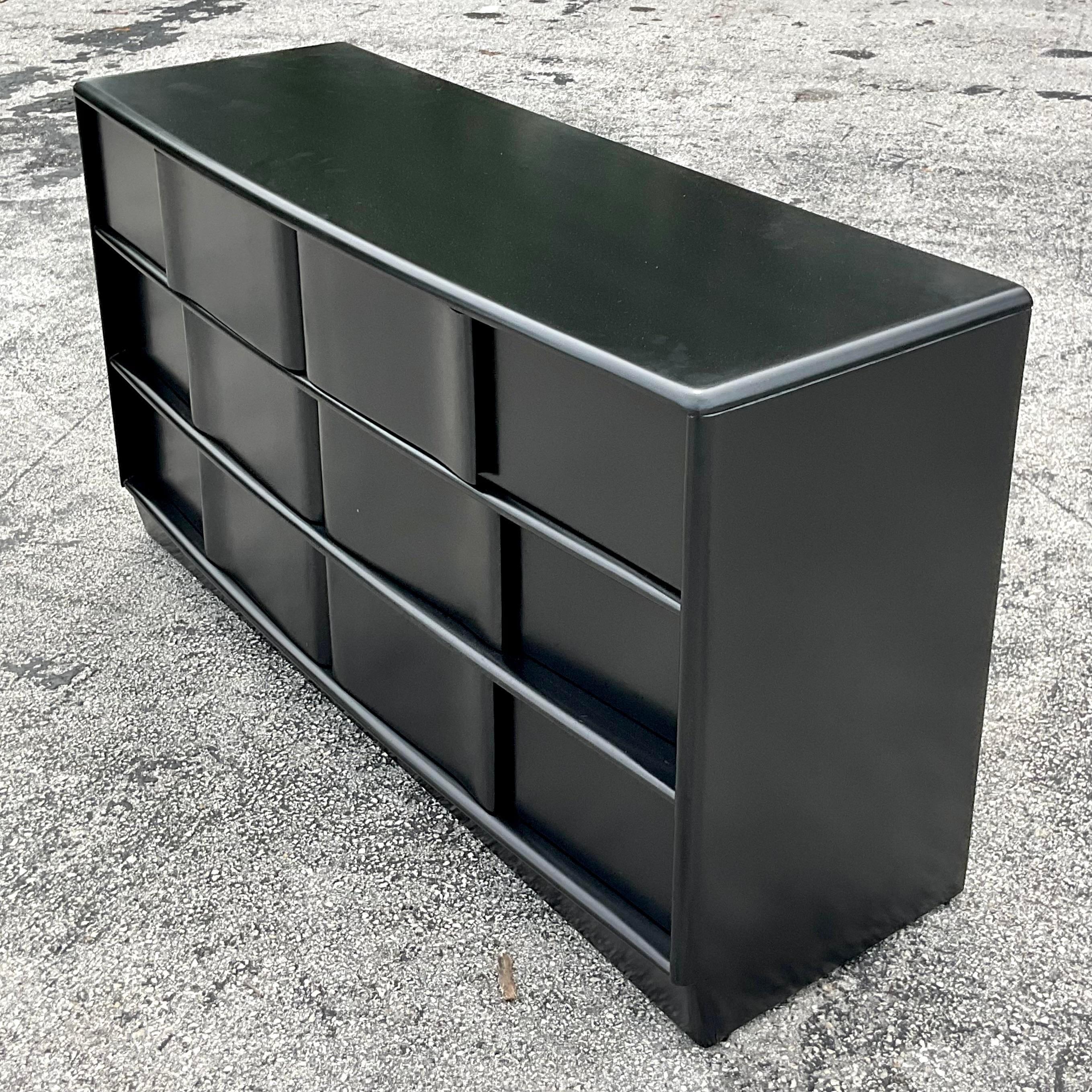 A fabulous vintage MCM dresser. The coveted Heywood Wakefield wave front dresser. Painted a chic matte black. Tagged on the inside. Acquired from a Palm Beach estate.