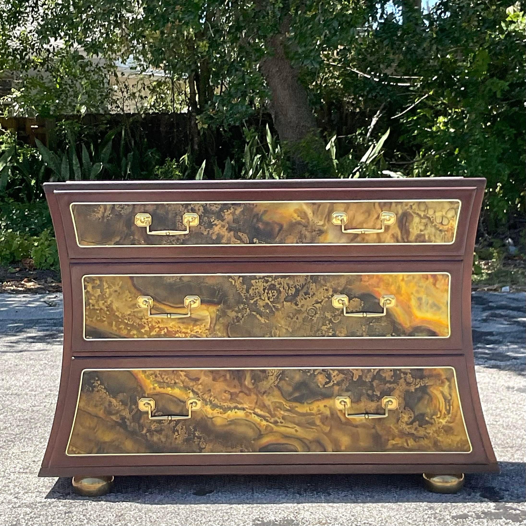 A fabulous vintage Boho chest of drawers. Done in the manner of Mastercraft. Beautiful acid etched drawer fronts and top. Acquired from a Palm Beach estate