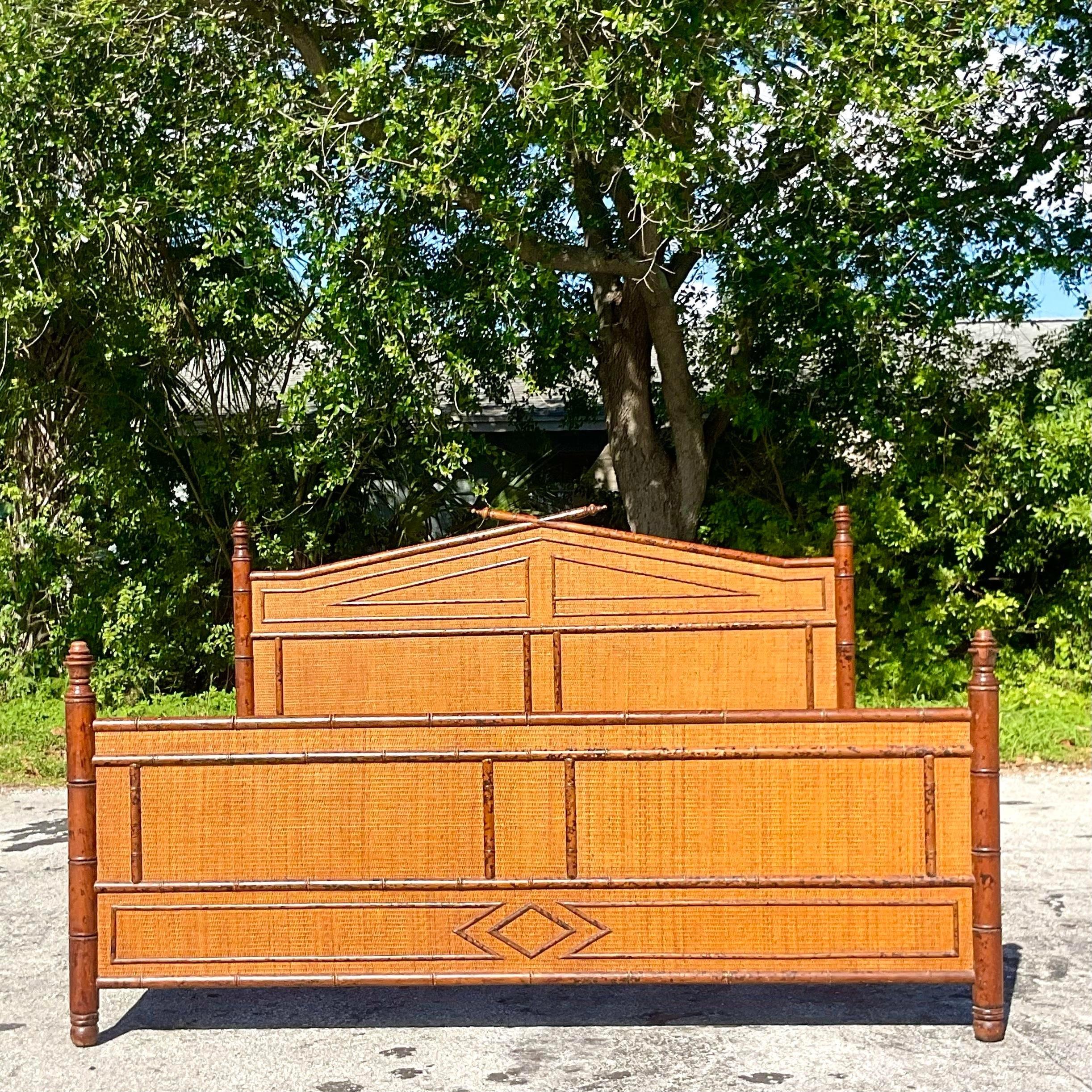 A fabulous vintage Coastal King size bed frame. A chic burnt bamboo bed frame with insert woven rattan panels. The coveted diamond design in rich warm browns. Coordinating pieces also available on my page. Acquired from a Palm Beach estate