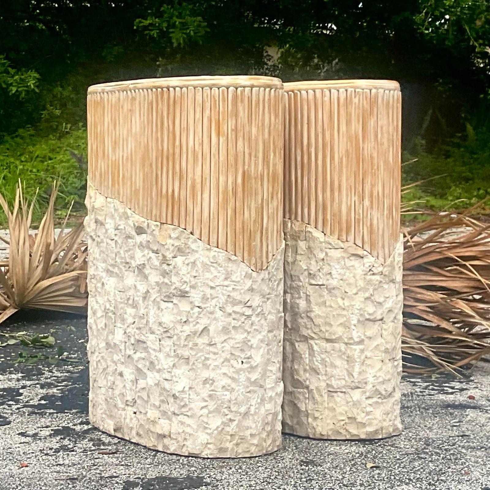 A stunning pair of vintage Boho dining table pedestals. Chic cerused reed with a wrap of tessellated stone. Perfect as a dining table or desk. You decide! Just add your glass and you are ready to go! Acquired from a Palm Beach estate

The pedestals