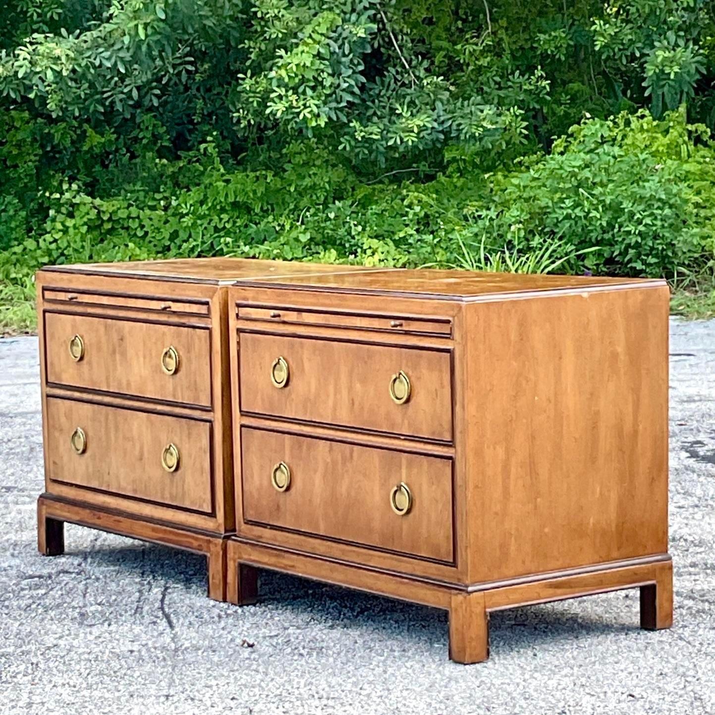 A fabulous pair of vintage Boho nightstands. Made by the iconic Drexel group and tagged inside the drawer. Burl wood frame with incredible wood grain detail. Acquired from a Palm Beach estate. 