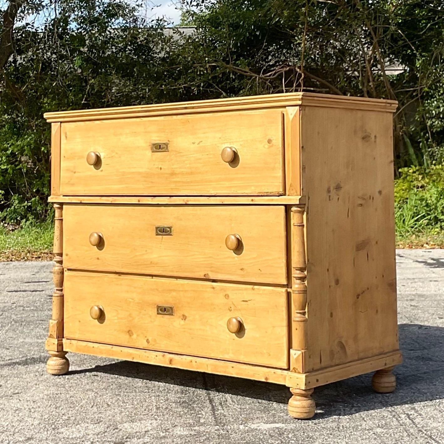 A fabulous vintage Boho chest of drawers. A chic pine cabinet with gorgeous wood carved detail. Purchased in Paris 25 years ago and brought to the states. Acquired from a Palm Beach estate.