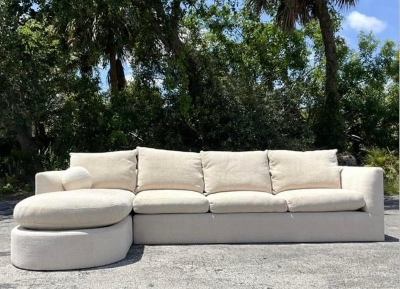 Experience laid-back luxury with this Vintage Boho Kreiss sectional sofa. Combining Bohemian flair with American comfort, this sofa offers both style and relaxation. A timeless piece that adds a cozy and eclectic touch to any living space.
