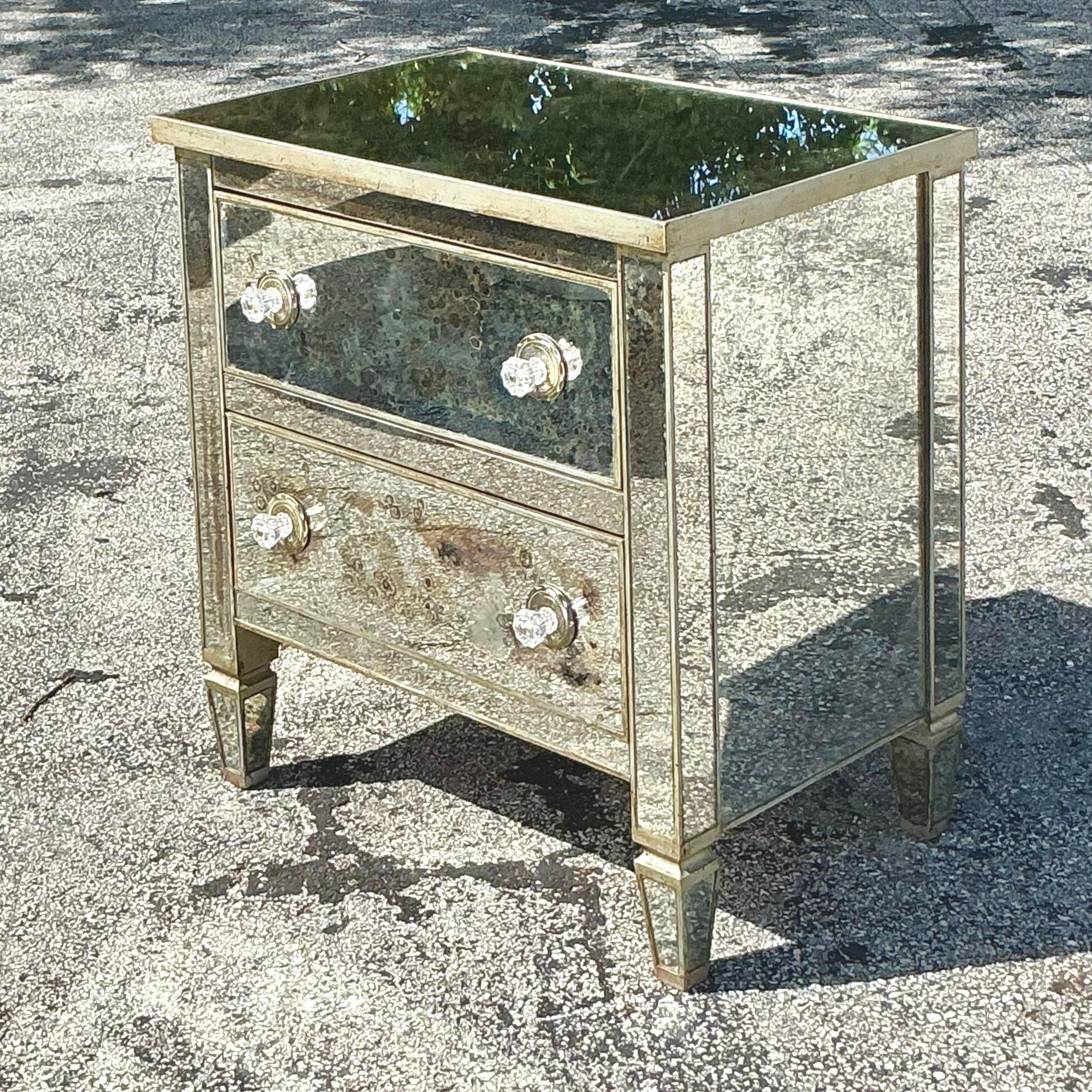 This vintage boho mirrored nightstand brings elegance and eclectic charm to any bedroom. Its reflective surfaces catch the light beautifully, adding a sense of space and brightness, while the boho-inspired design adds warmth and character. With