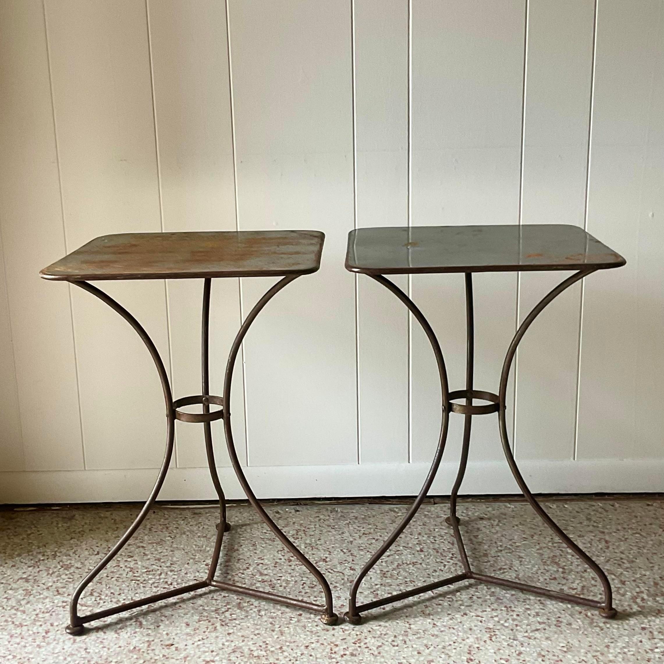 A fabulous pair of vintage Boho aside tables. A chic tripod frame pedestal with a flat square surface. An incredible all over rusty patina from time. Perfect as side tables, but would also be gorgeous as pedestals. You decide! Acquired from a Miami