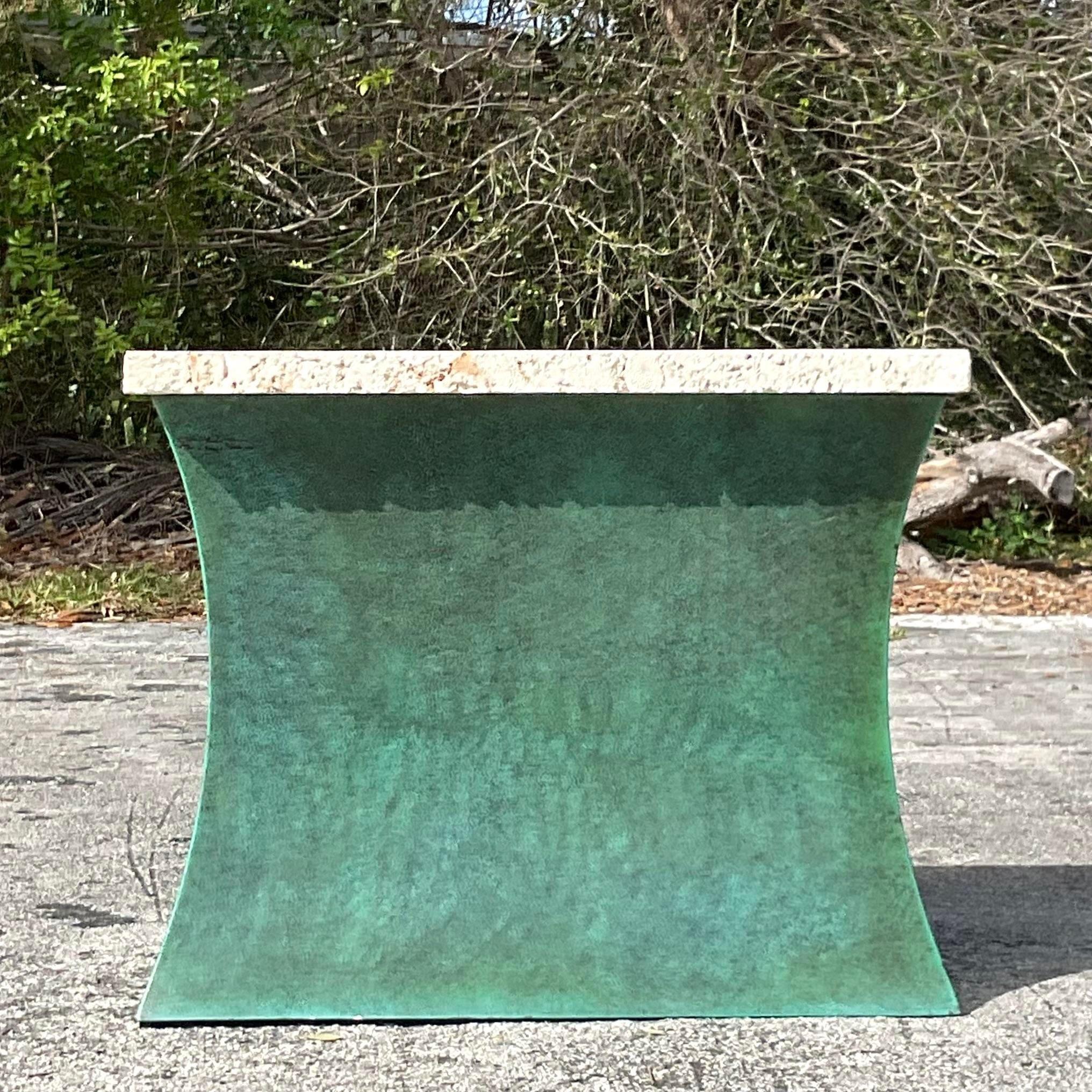 A fabulous vintage Boho console table. A chic hand patinated steel base with a gorgeous coquina slab that rests on top. Simple yet powerful. Acquired from a Palm Beach estate.