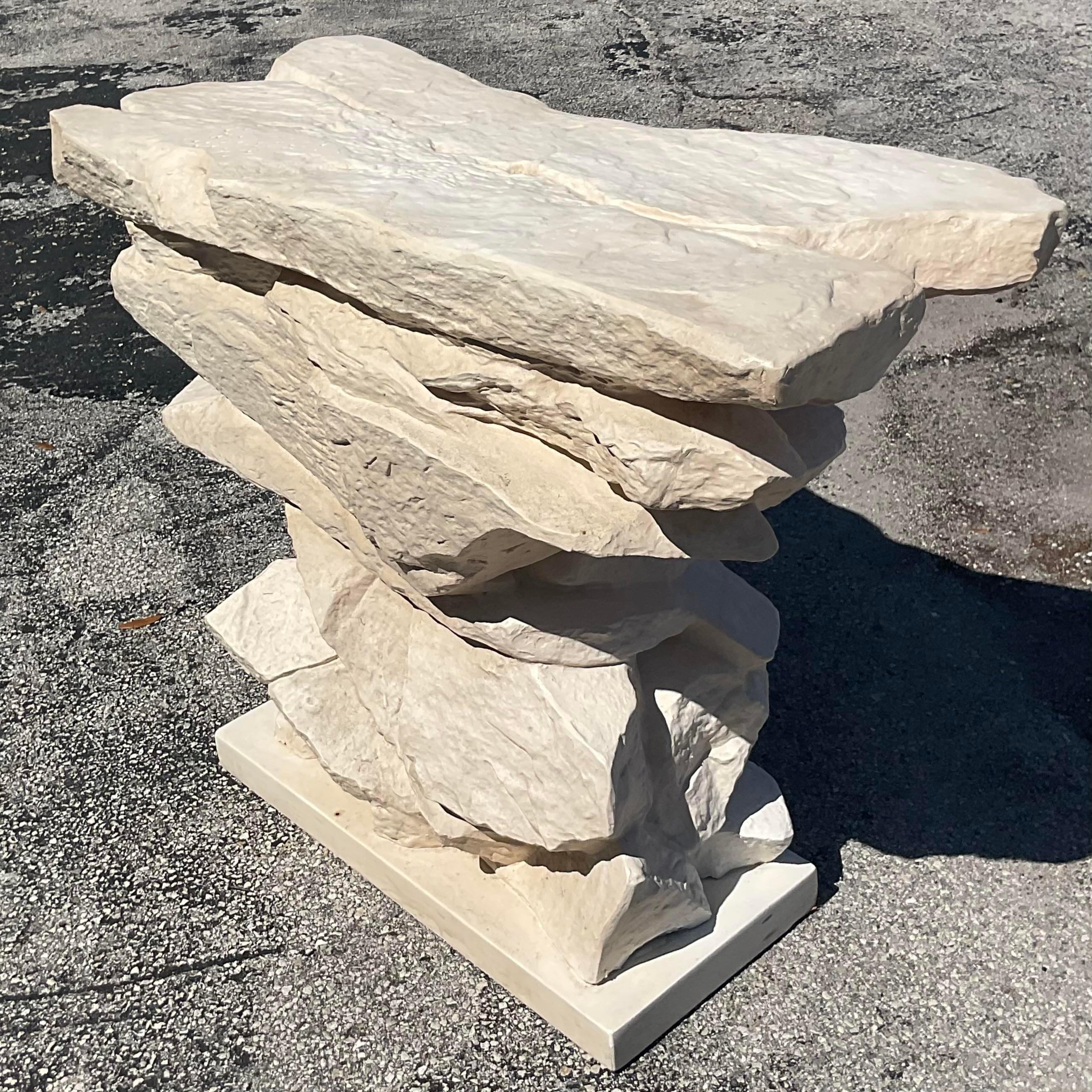 An exceptional vintage Boho console table. A chic stacked rock design in plaster. Done in the Ajmer of Sirmos. Acquired from a Palm Beach estate.