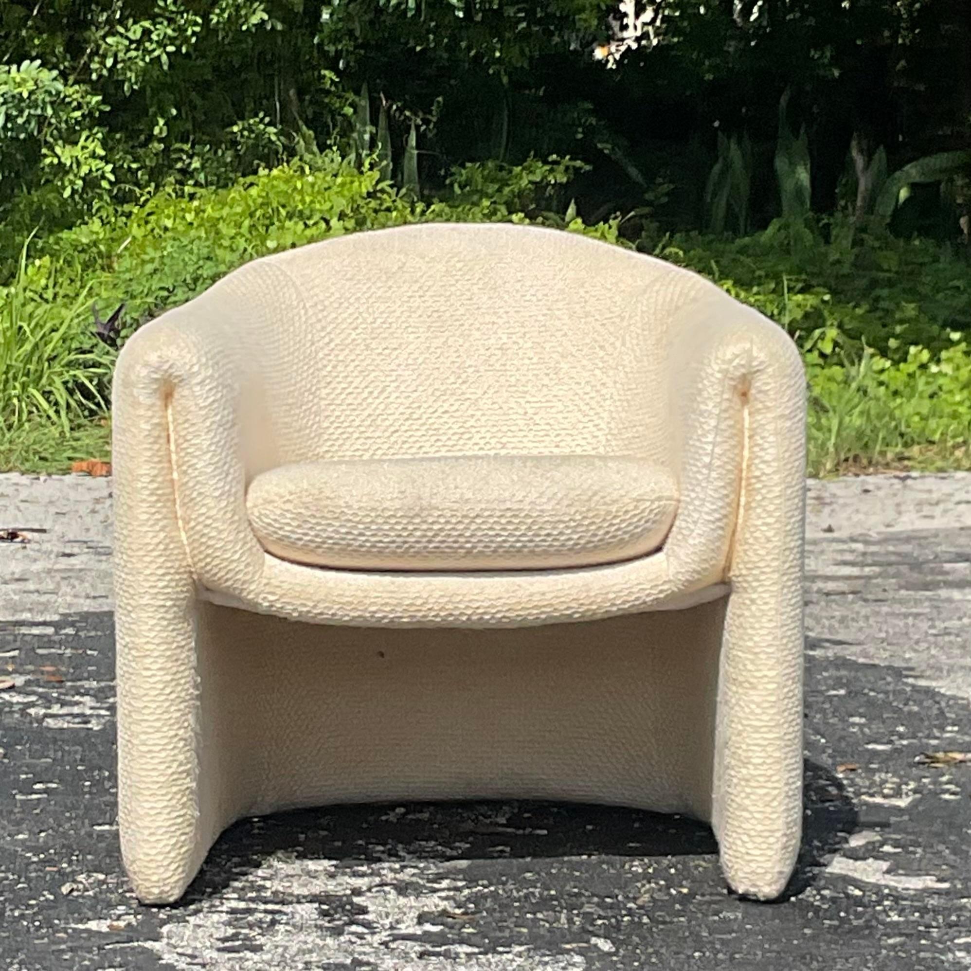 A fabulous vintage Boho lounge chair. Made by the iconic Preview group and tagged under the chair. A great Postmodern shape makes it an easy addition to any space. Needs a little TLC. Acquired from a Palm Beach estate.