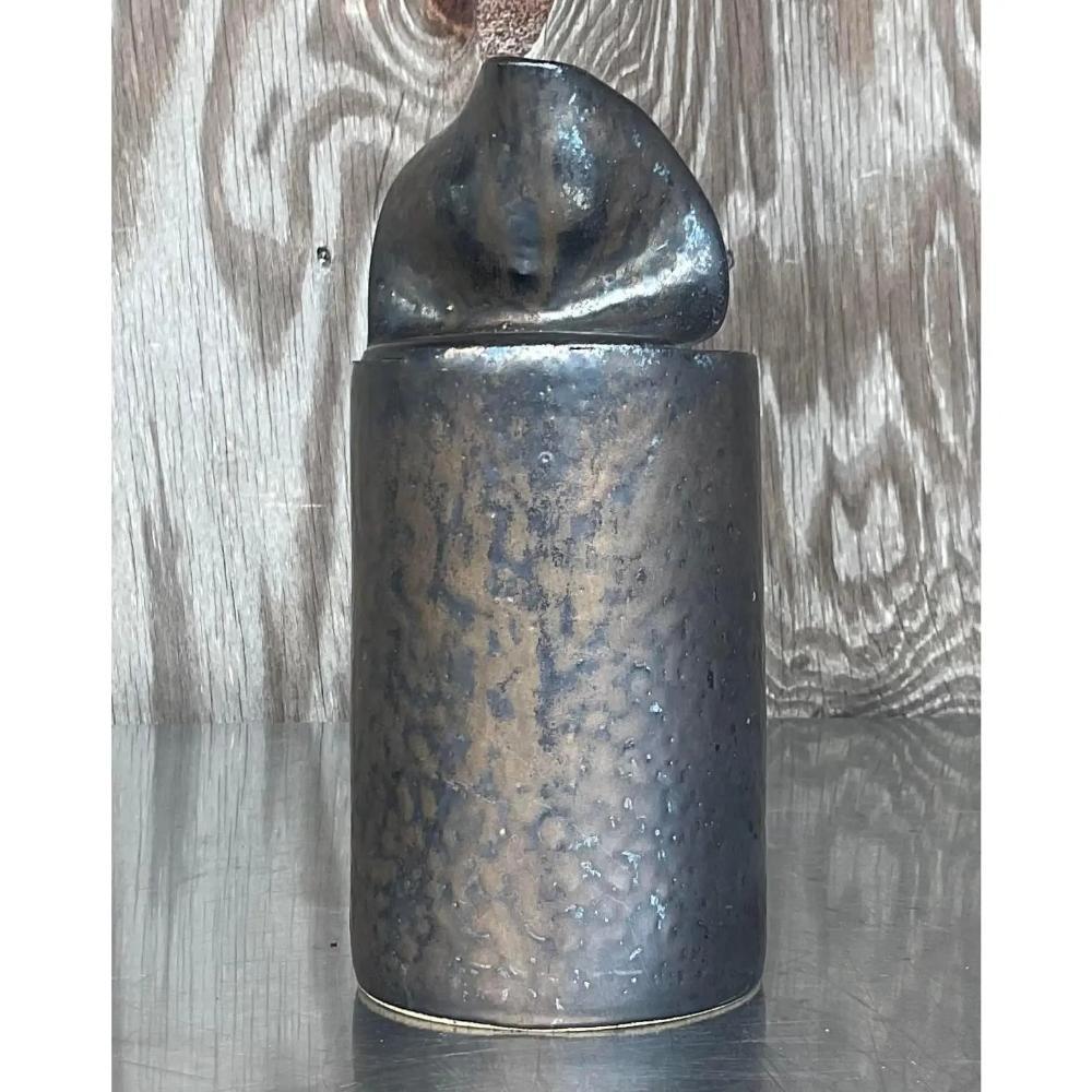A fabulous vintage Signed studio pottery vase. A charming composition of an open tin can, but in a rich brown.