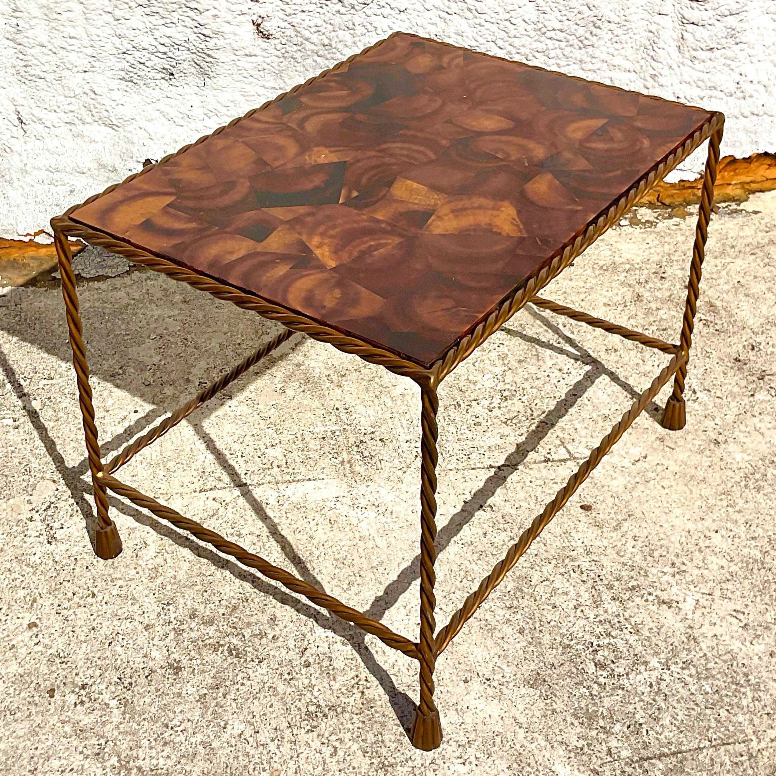 Transform your living space with this vintage boho tessellated coconut shell coffee table, an embodiment of American style and ingenuity. Crafted with meticulous attention to detail, its unique design marries natural elements with artistic flair.