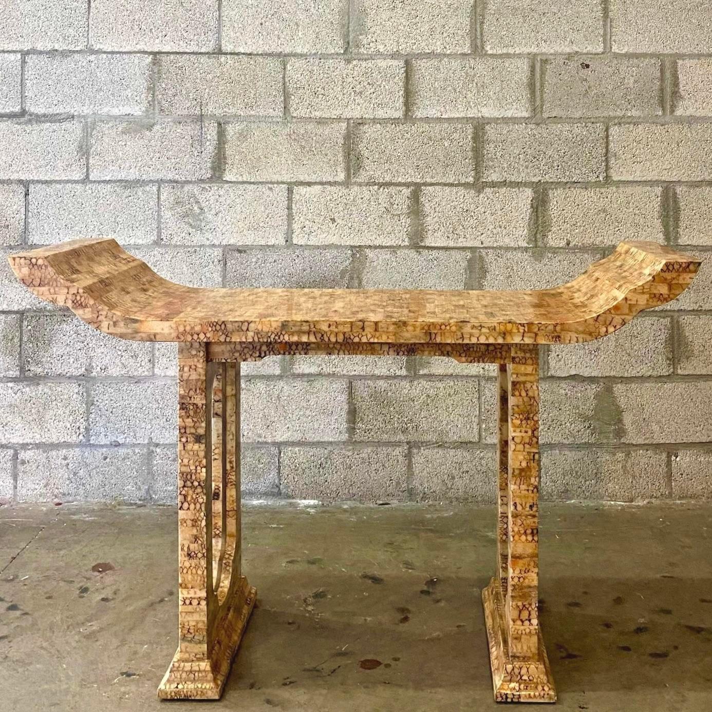 A stunning vintage Boho console table. A chic tessellated coconut shell on a stunning pagoda shape. Acquired from a Palm Beach estate.