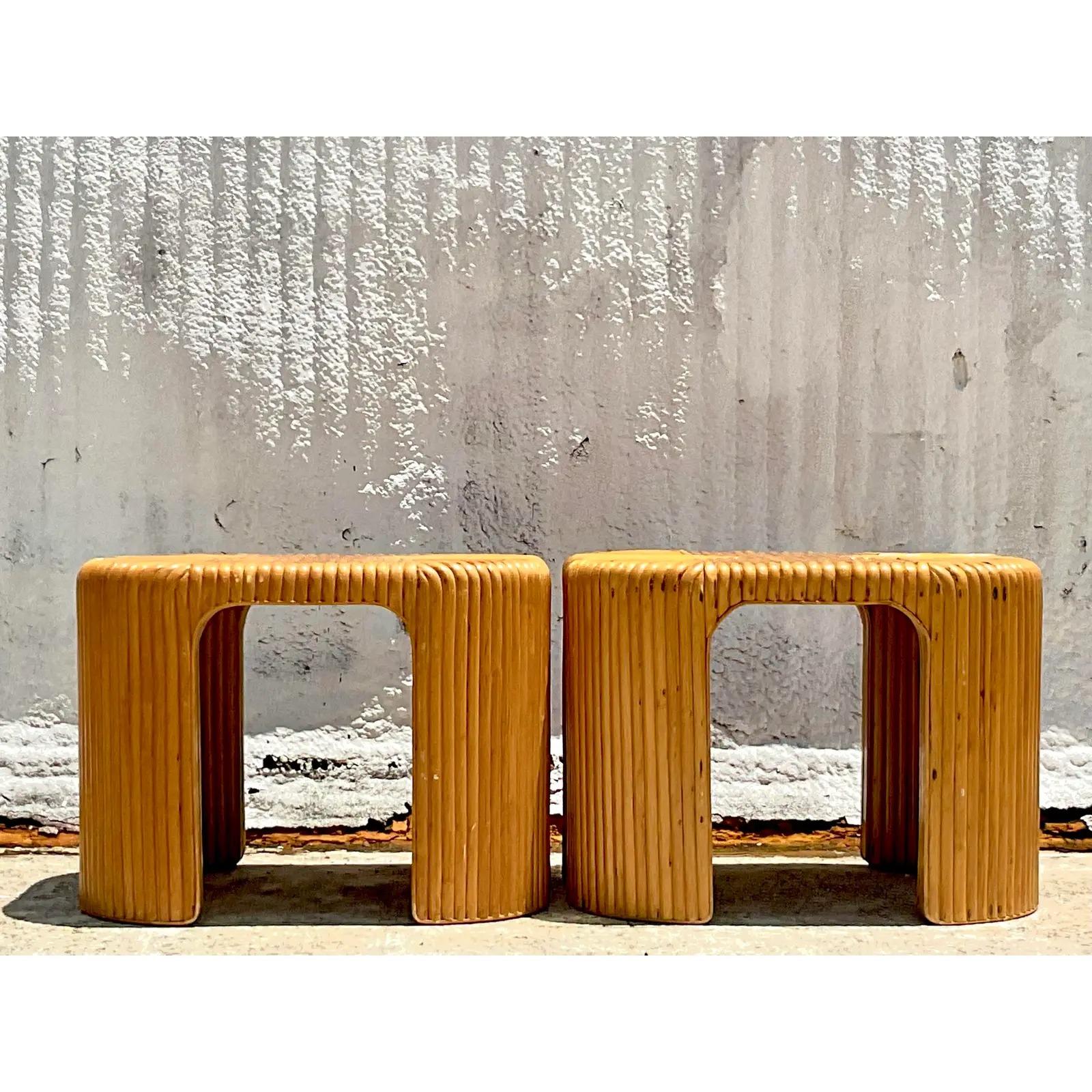 A fantastic pair of vintage Coastal side tables. A fabulous thick pretzel rattan in a chic waterfall design. Acquired from a Palm Beach estate.