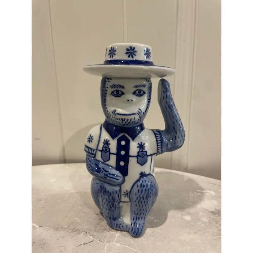 FABULOUS Vintage Late 20th Century Chinoiserie Blue & White Monkey Candle Stick Holder. The piece measures 7 inches tall x 4 inches wide x 3.25 inches deep