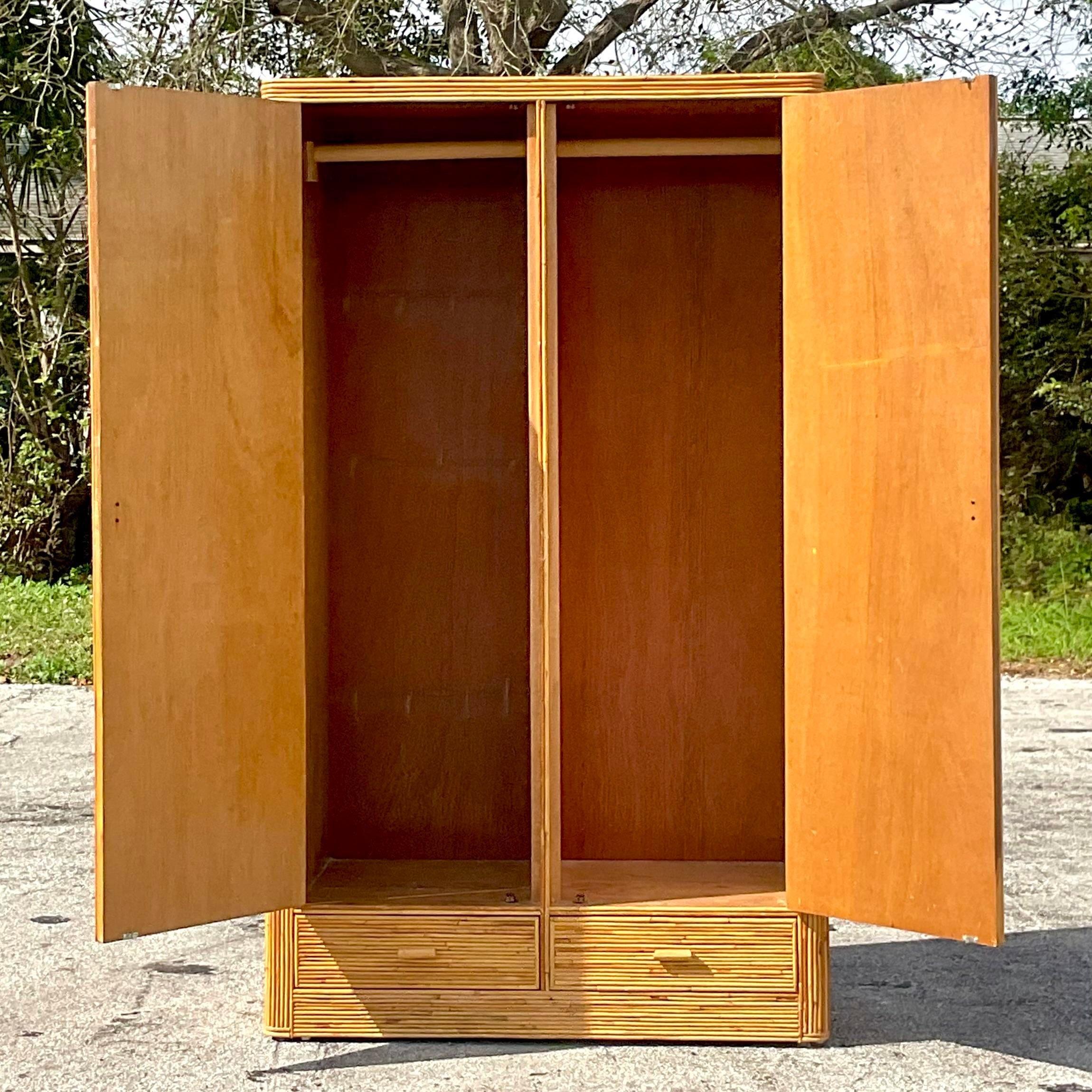 Late 20th Century Vintage Coastal Arched Pencil Reed Armoire In Good Condition In west palm beach, FL