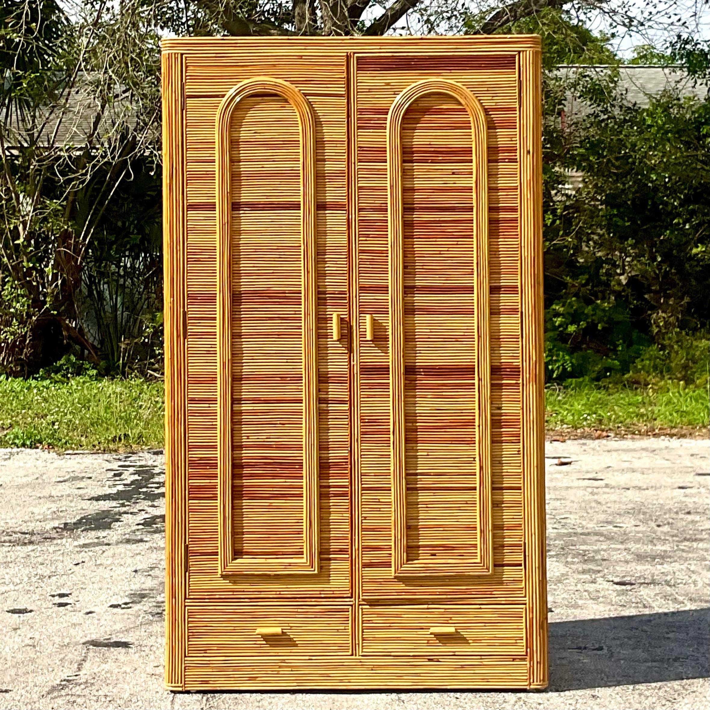 Late 20th Century Vintage Coastal Arched Pencil Reed Armoire 1