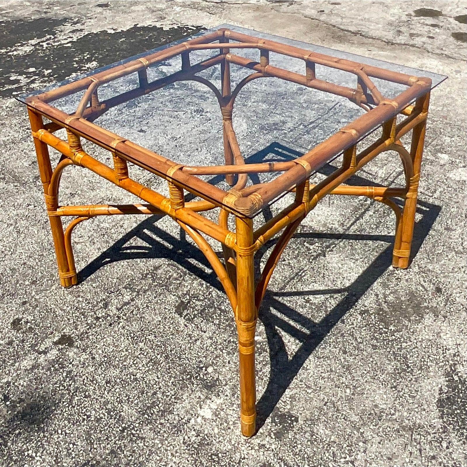 A fabulous vintage Coastal game table. Chic bent rattan with a clean and simple design. Acquired from a Palm Beach estate.