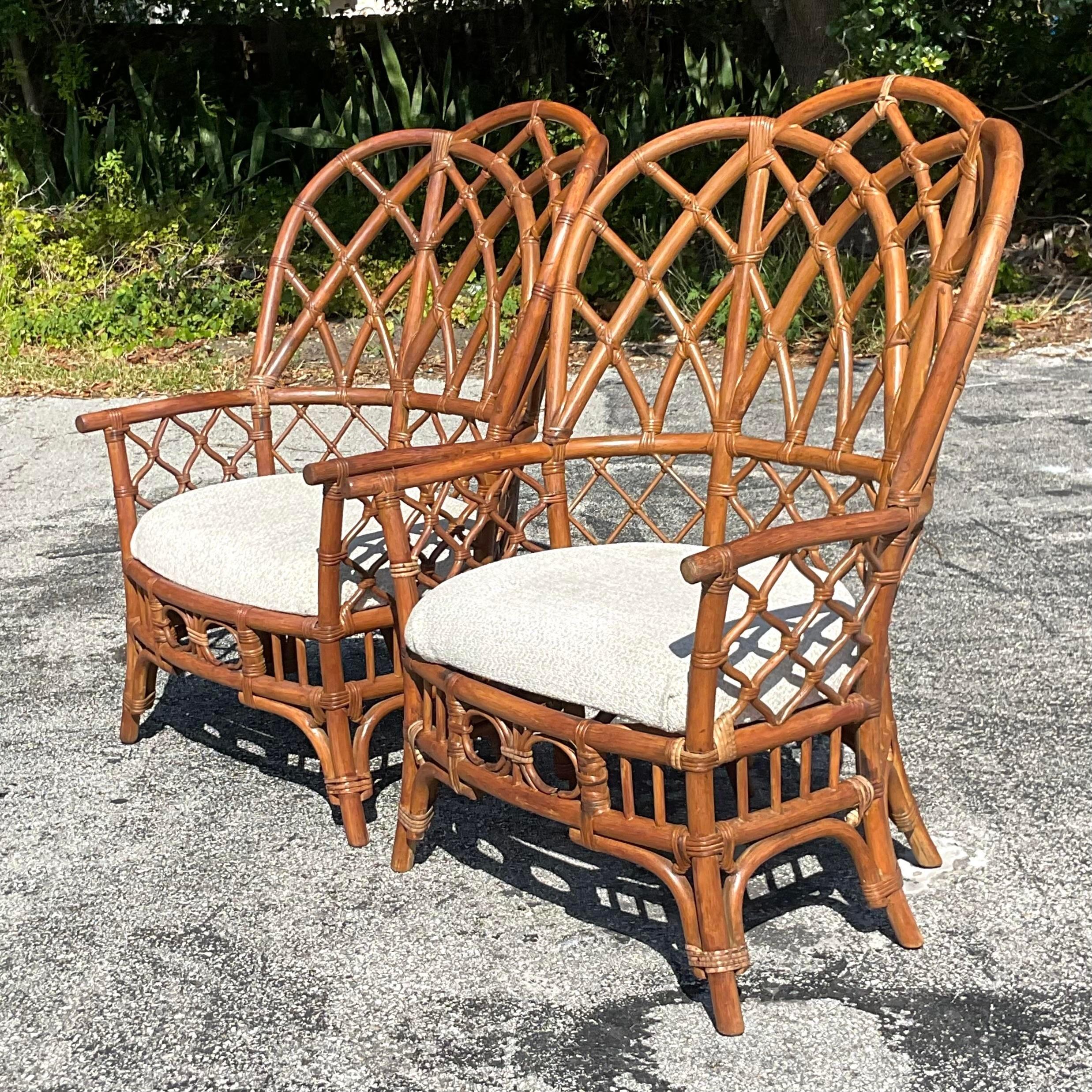 Philippine Late 20th Century Vintage Coastal Bent Rattan Wingback Chairs - a Pair For Sale