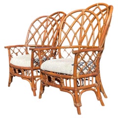 Late 20th Century Vintage Coastal Bent Rattan Wingback Chairs - a Pair
