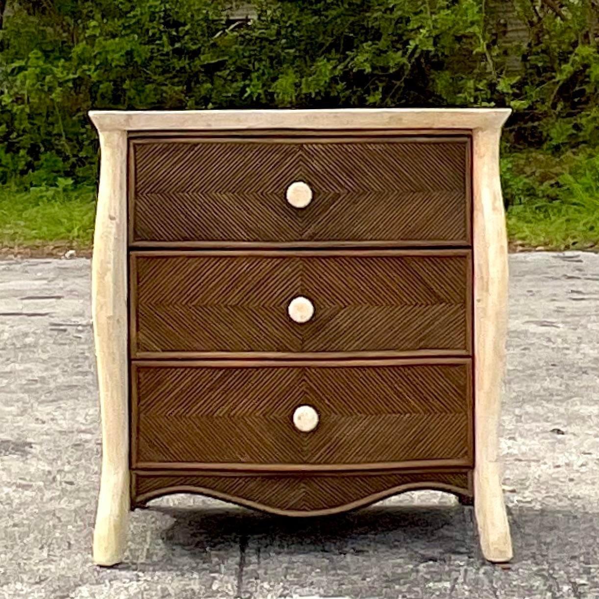 A fabulous vintage Coastal chest of drawers. A chic ebony pencil reed in a Chevron design. Tessellated stone trim along the frame. Acquired from a Palm Beach estate.