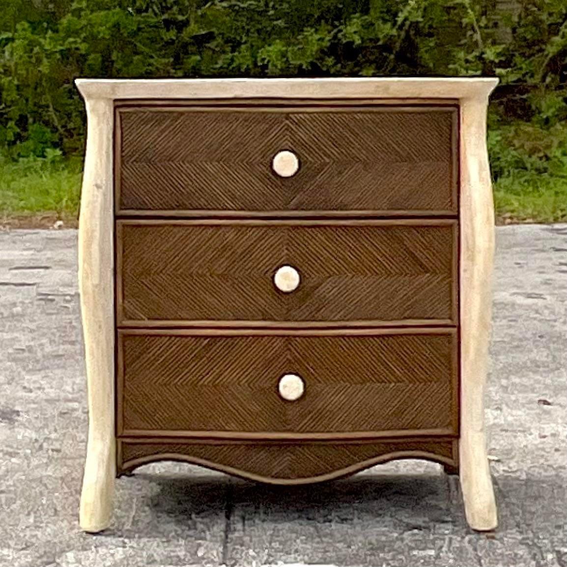 A fabulous vintage Coastal chest of drawers. A chic ebony pencil reed in a Chevron design. Tessellated stone trim along the frame. Acquired from a Palm Beach estate.