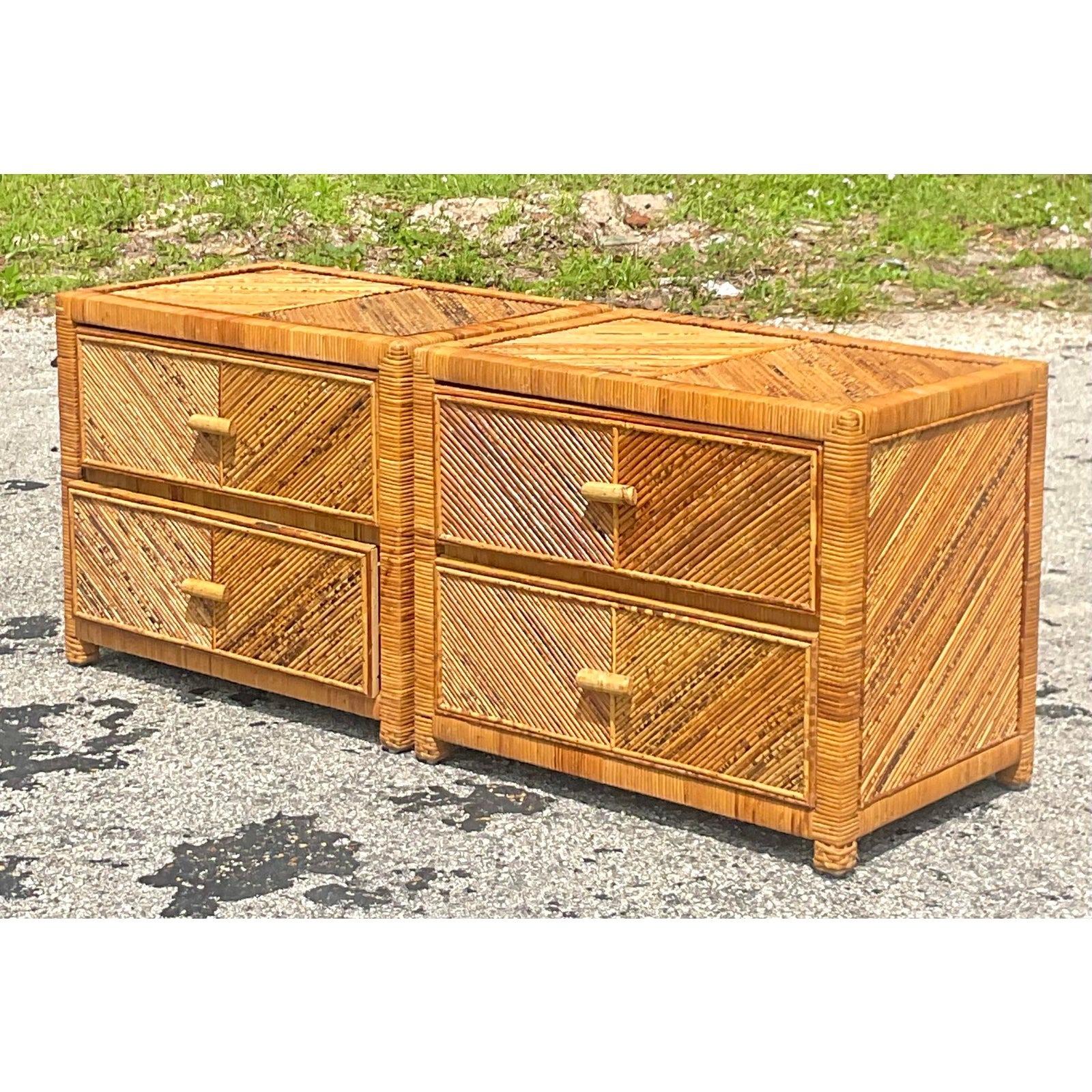 A fabulous pair of vintage Coastal nightstands. Beautiful warm pencil reed in a chic Chevron pattern. Two drawers each. Acquired from a Palm Beach estate.