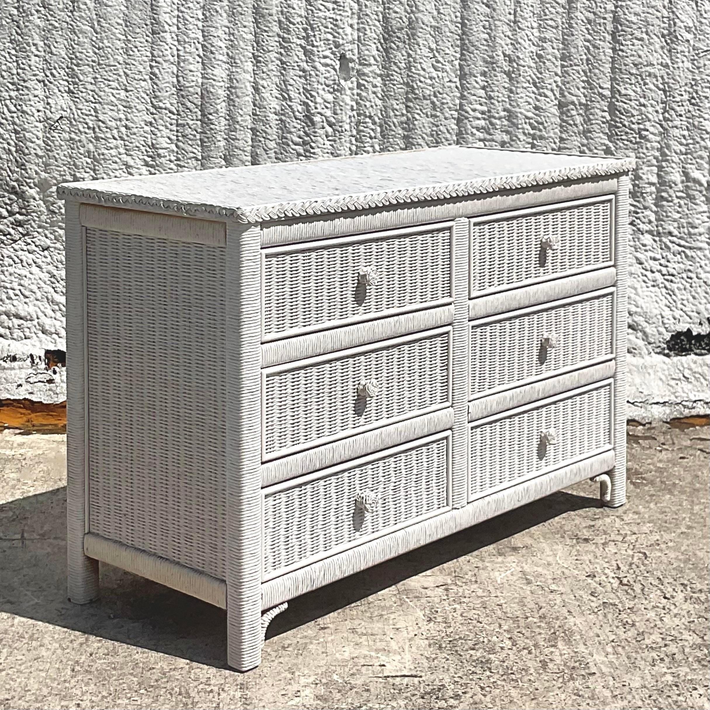 Dresser. Crafted with the finest wicker materials and timeless American craftsmanship, this dresser exudes coastal charm and practicality. Elevate your space with its classic design and create a serene retreat inspired by the beauty of the seaside.