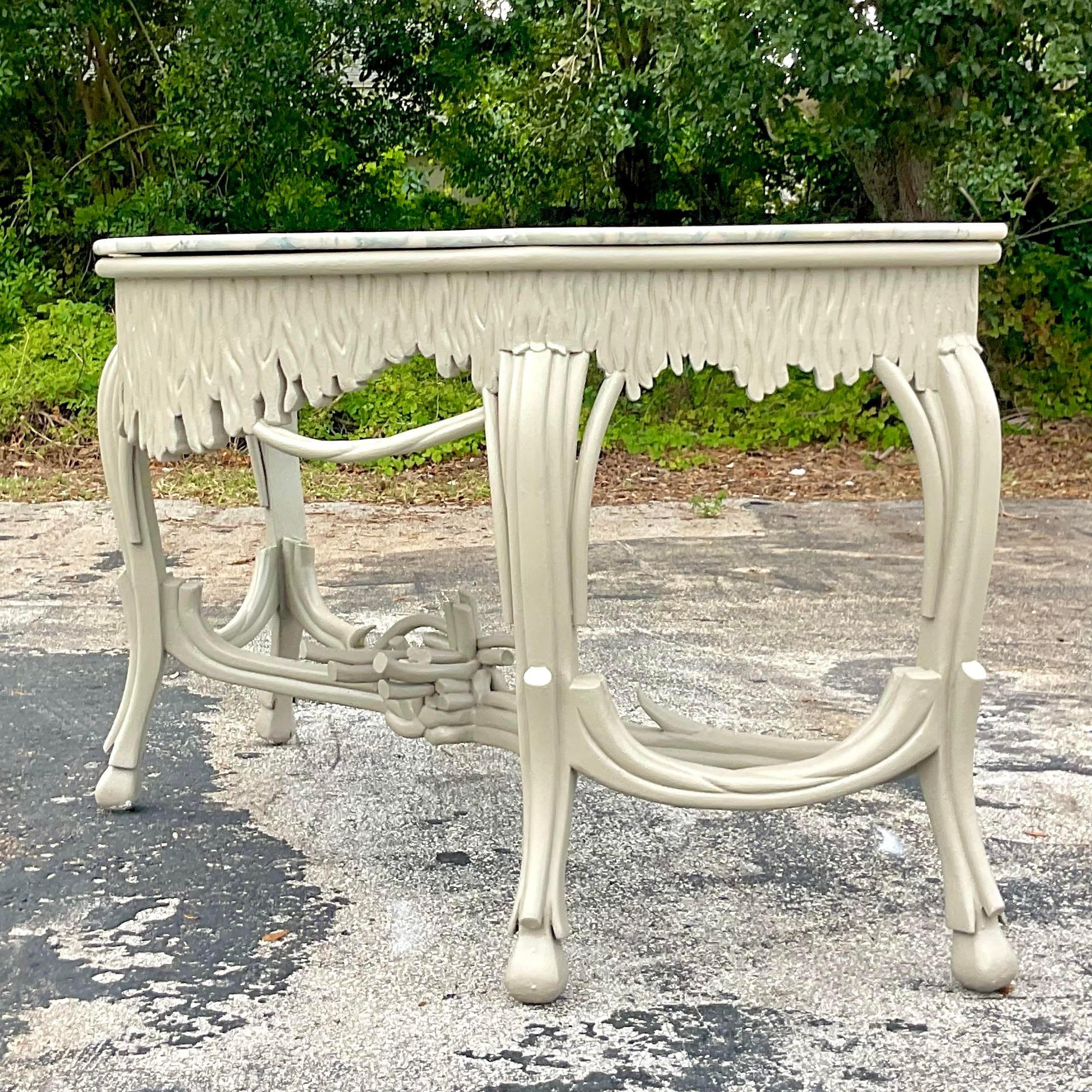 A stunning vintage Coastal console table. A chic Faux Bois design with an incredible stone top. Lacquered a matte celadon to coordinate perfectly with the stone. Acquired from a Palm Beach estate.