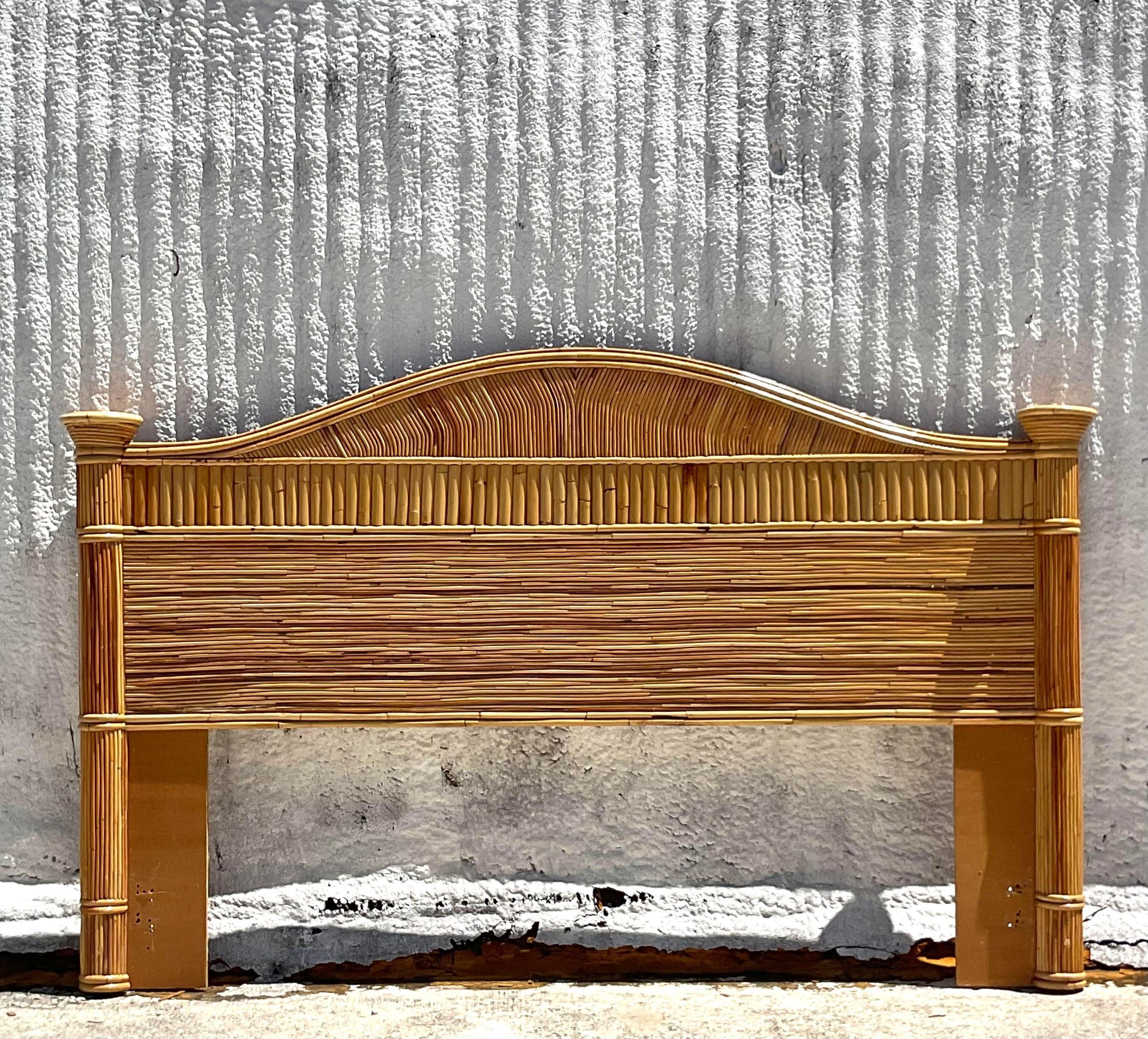 Transform your bedroom into a coastal retreat with this Vintage Pencil Reed King Headboard. Inspired by classic American craftsmanship, this headboard exudes timeless charm with its coastal aesthetic and intricate woven design. Crafted to