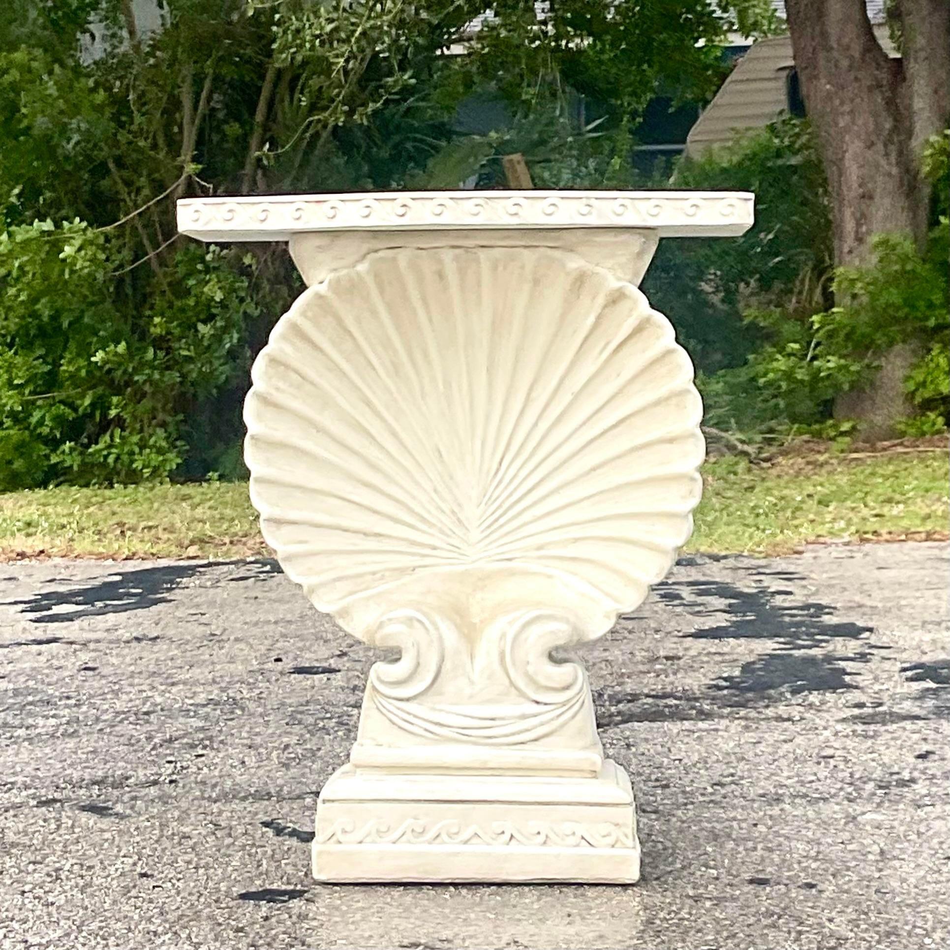 A fabulous vintage Coastal console table. A chic plaster clam shell with a fabulous wave motif top. Aguirre from a Palm Beach estate.