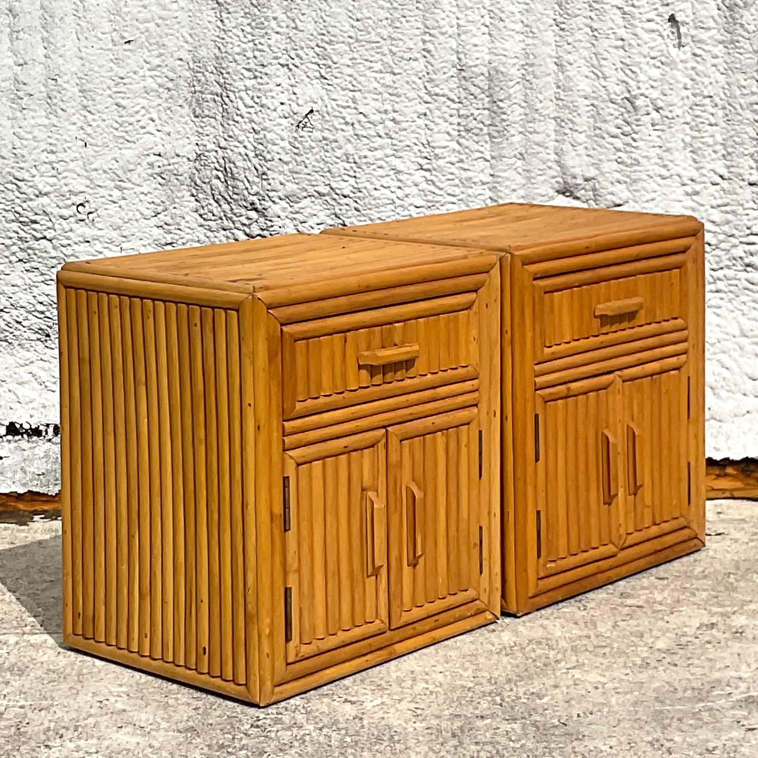 Elevate your bedroom with this pair of vintage coastal pretzel rattan nightstands, epitomizing American coastal charm and craftsmanship. With their unique design and natural allure, they bring a touch of seaside sophistication to your bedside,