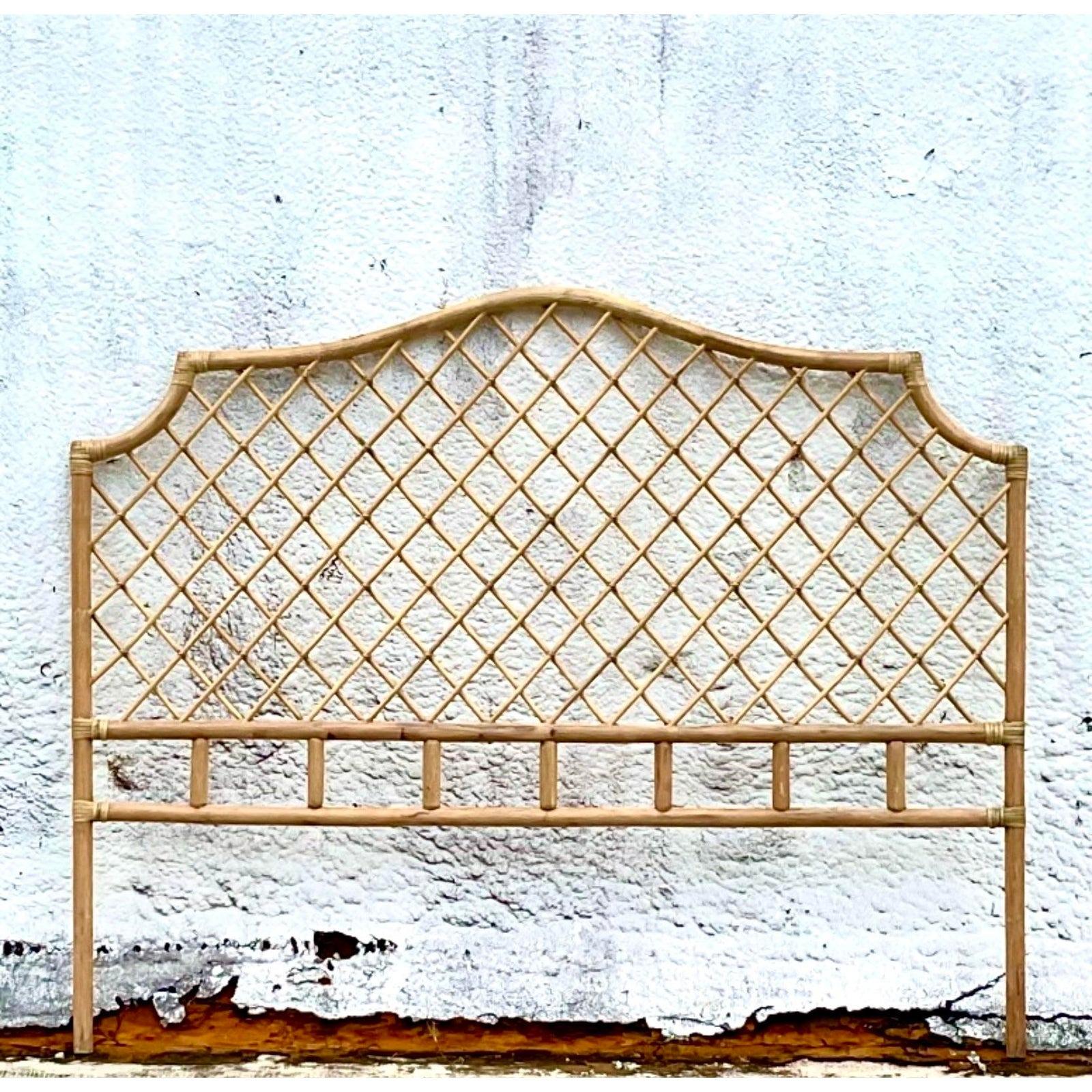 A fabulous vintage Coastal queen headboard. A chic trellis design with notched corners. Acquired from a Palm Beach estate.