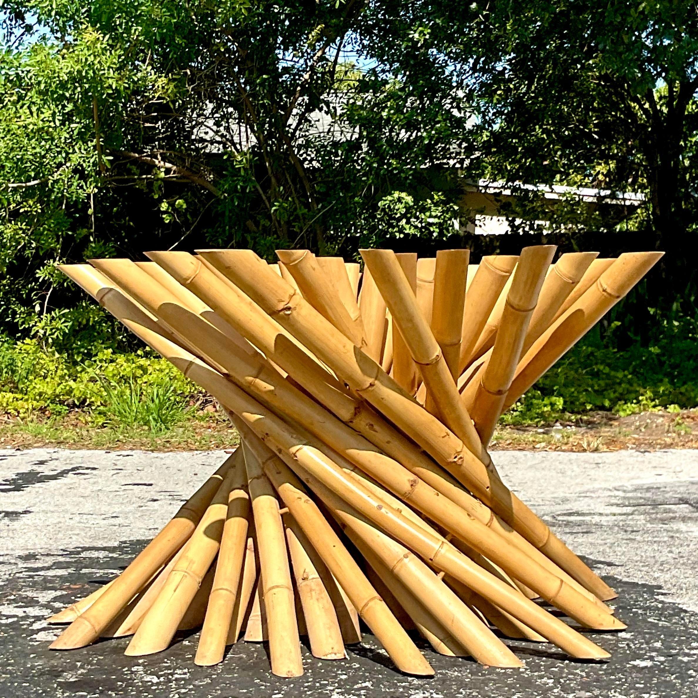 Bring a touch of seaside charm to your dining area with this vintage Coastal dining table pedestal, crafted from twisted bamboo. A distinctive American style piece that adds natural elegance and a coastal vibe to any space.