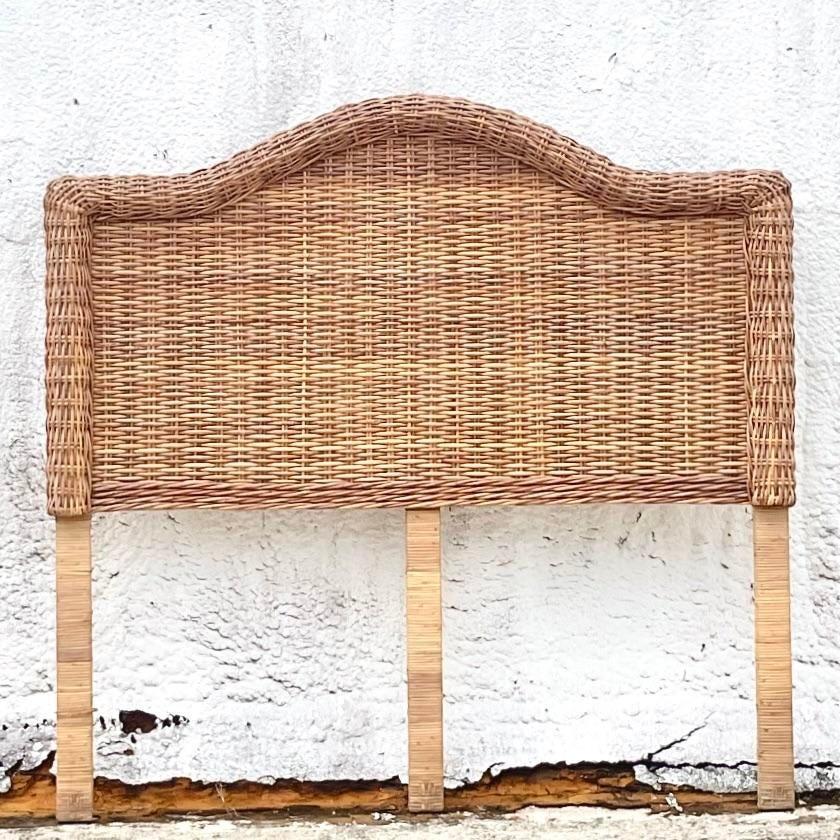 A fantastic vintage Coastal Full headboard. Chic heavy woven rattan in a clean arched design. Acquired from a Palm Beach estate