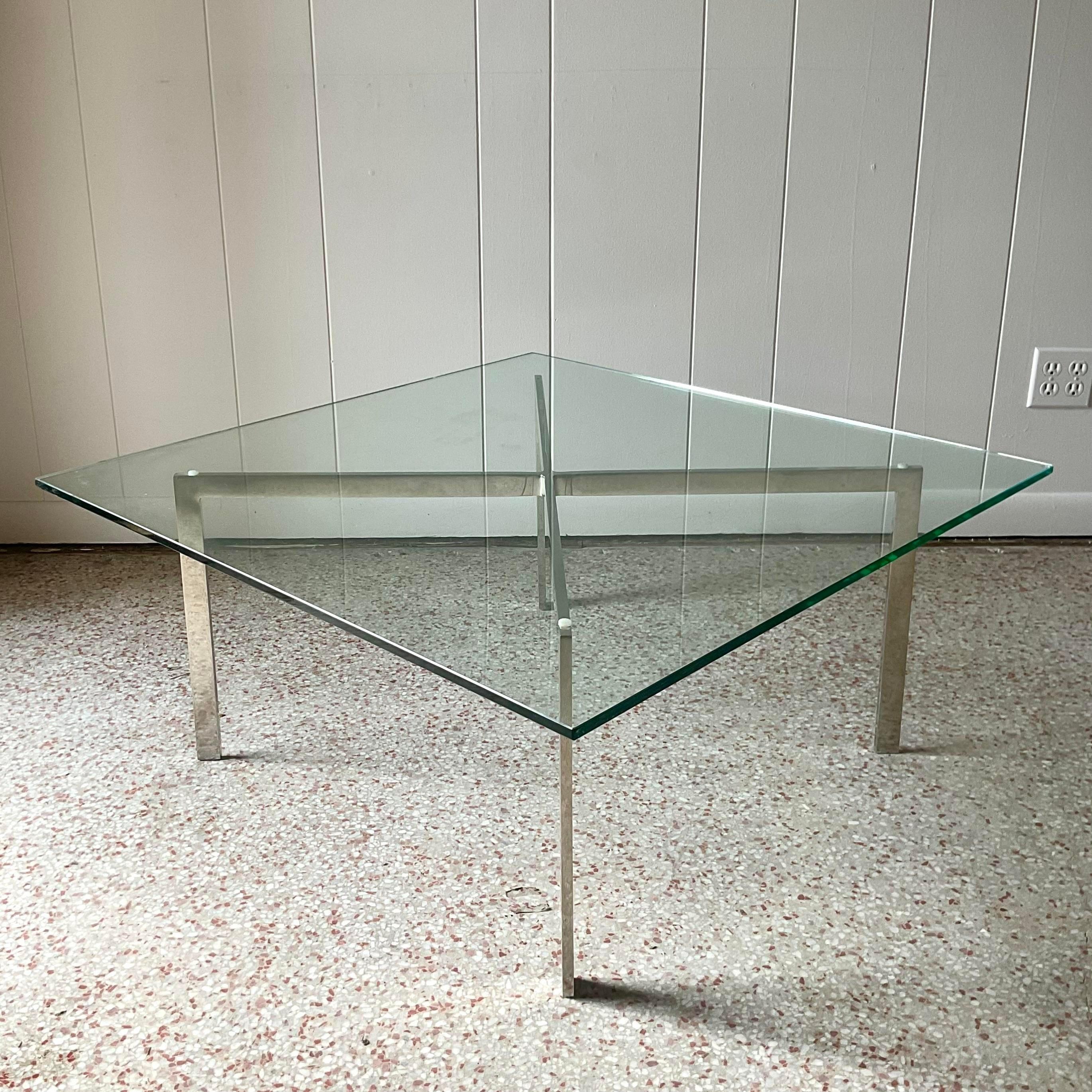 A fabulous vintage Contemporary coffee table. The iconic “Barcelona” table designed by Milo Baughman for Knoll studios. Signed on the leg interior. Acquired from a Palm Beach estate.