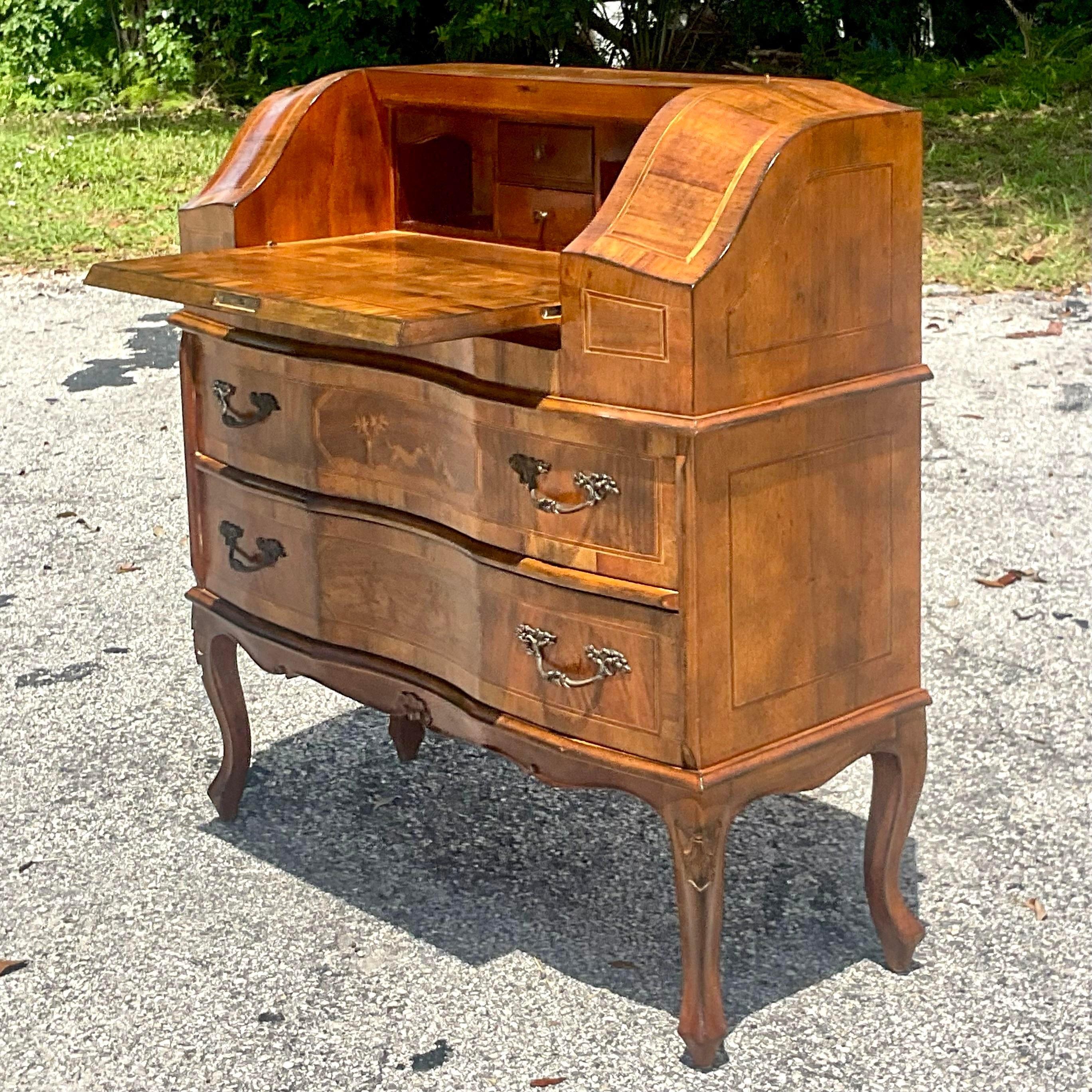 A fabulous vintage Boho Italian writing desk. Chic animal marquetry construction with incredible attention to detail. Drop top writing surface reveals lots of little interior drawers and cabinets