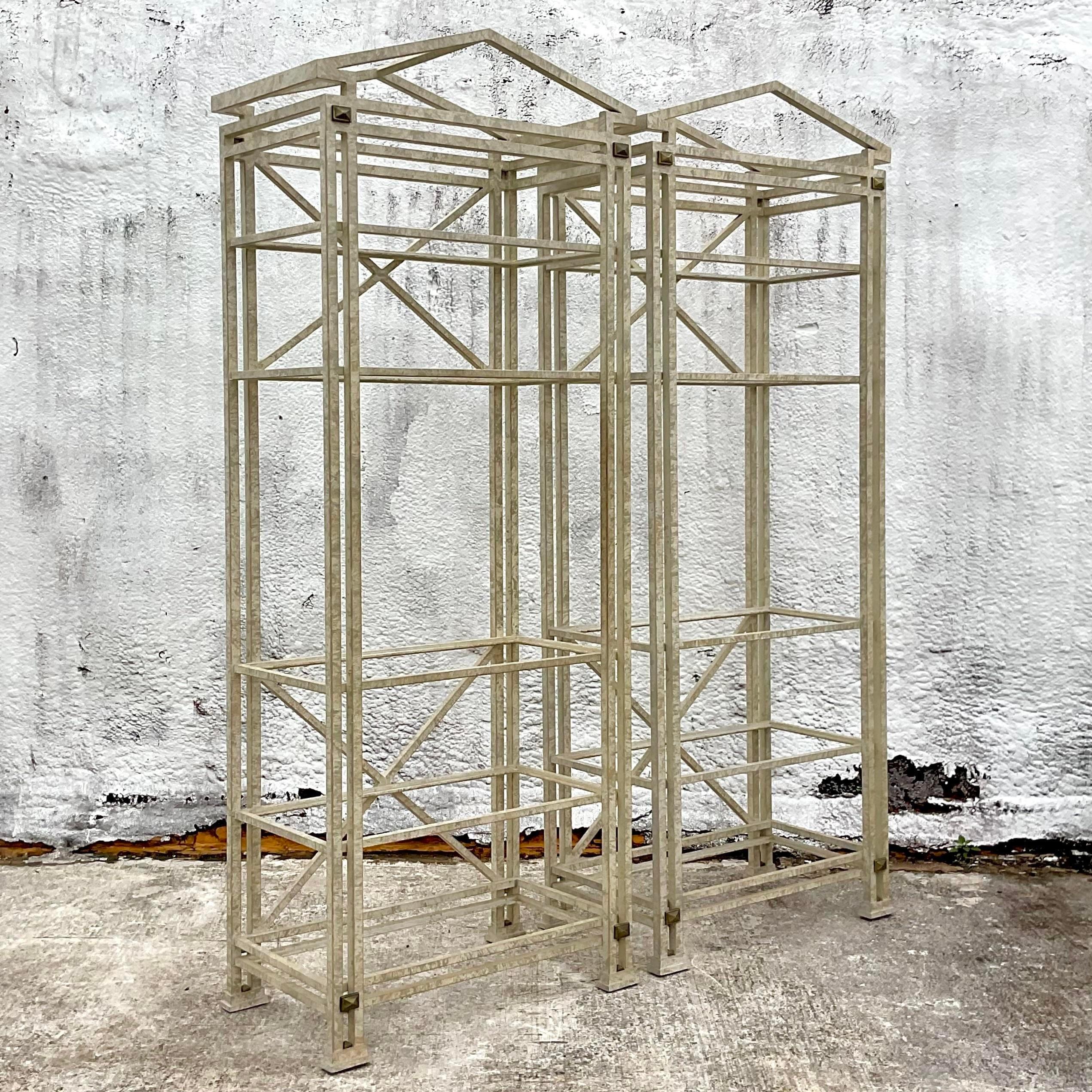 A fabulous pair of vintage Boho etagere. A chic Postmodern pediment shape. A chic painted finish over metal with Brass cap details. Perfect as is or paint them matte black for a different look. You decide! Inset glass shelves. Acquired from a Palm