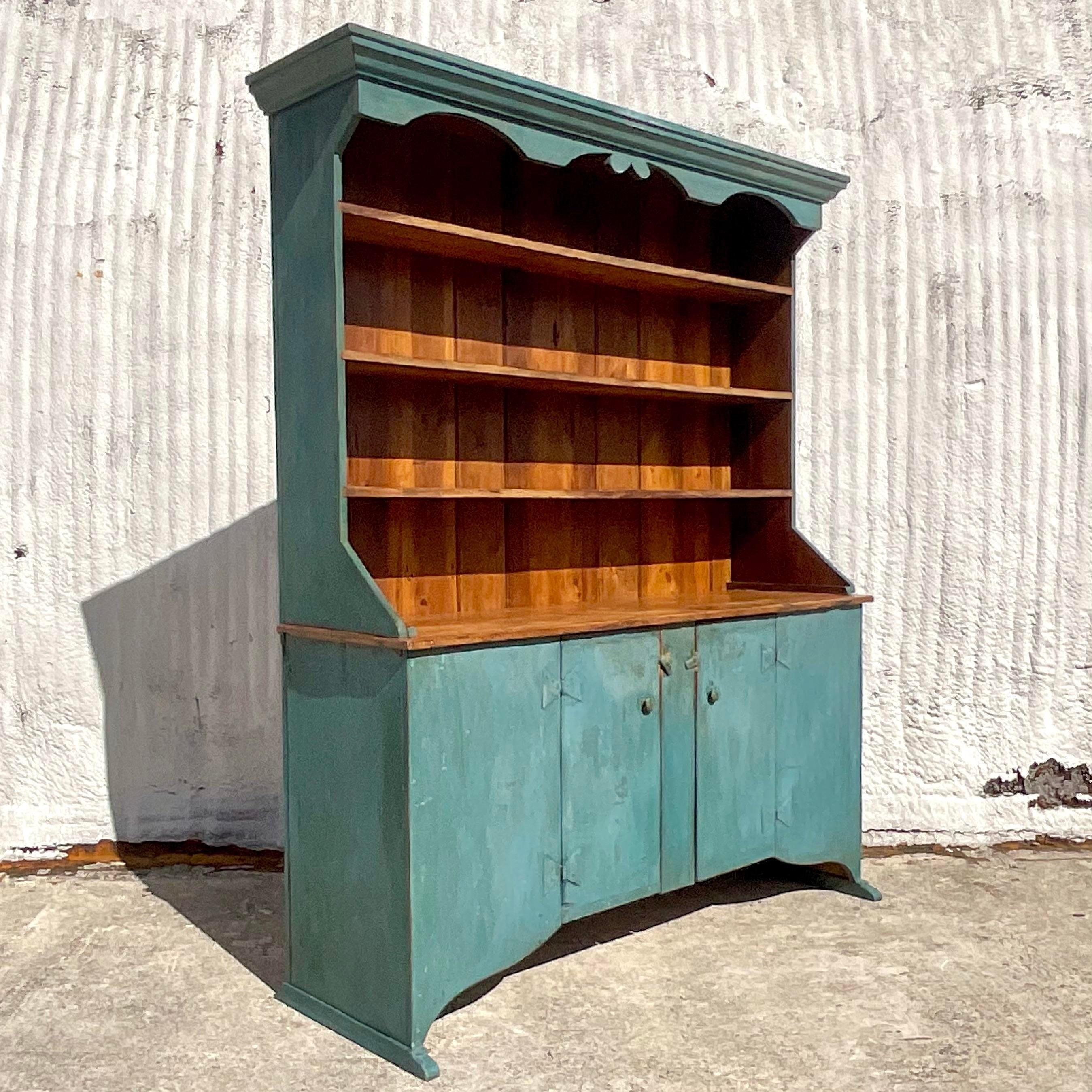 A fabulous vintage Boho Display hutch. A brilliant teal with a natural wood interior. Acquired at a Palm Beach estate.