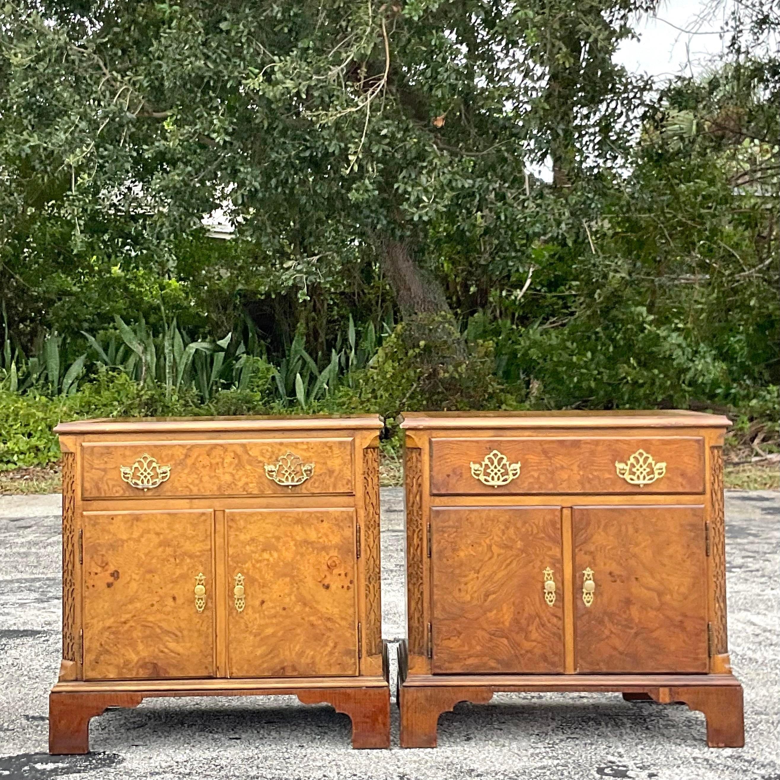 A fantastic pair of vintage Regency nightstands. Made by the iconic Baker group and tagged in the drawer. Gorgeous Burl wood cabinet with chic fretwork trim. Coordinating pieces also available on my page. Acquired from a Palm Beach estate