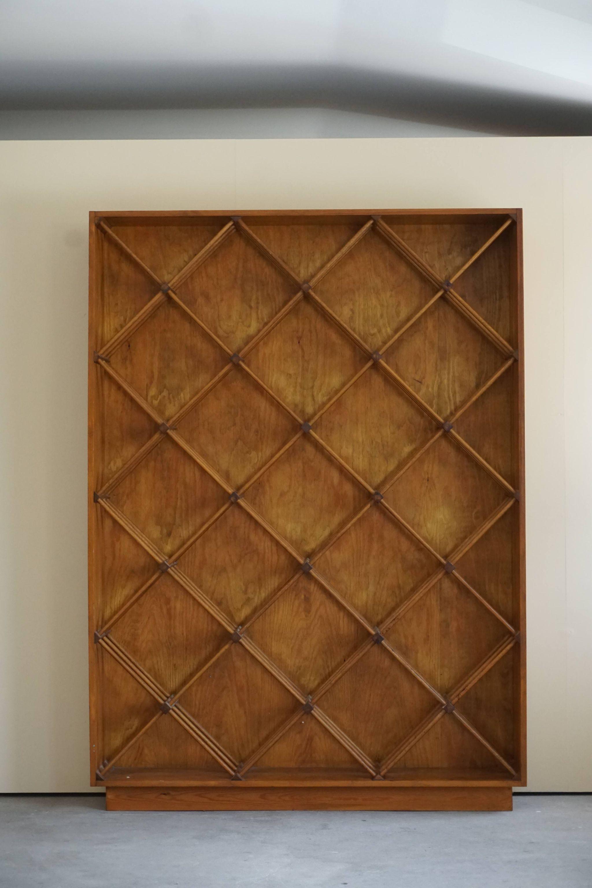 Huge late 20th century vintage Scandinavian wine rack in oak and pine, 1970s.
Can be used a book shelve/room divider as well.
Incredible sculptural piece in a good condition.