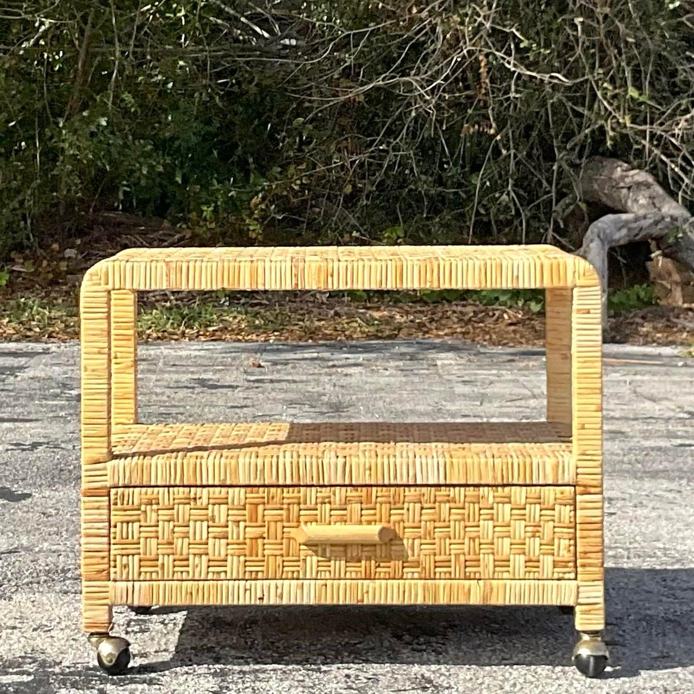Late 20th Century Vintage Woven Rattan TV Stand on Wheels In Good Condition For Sale In west palm beach, FL