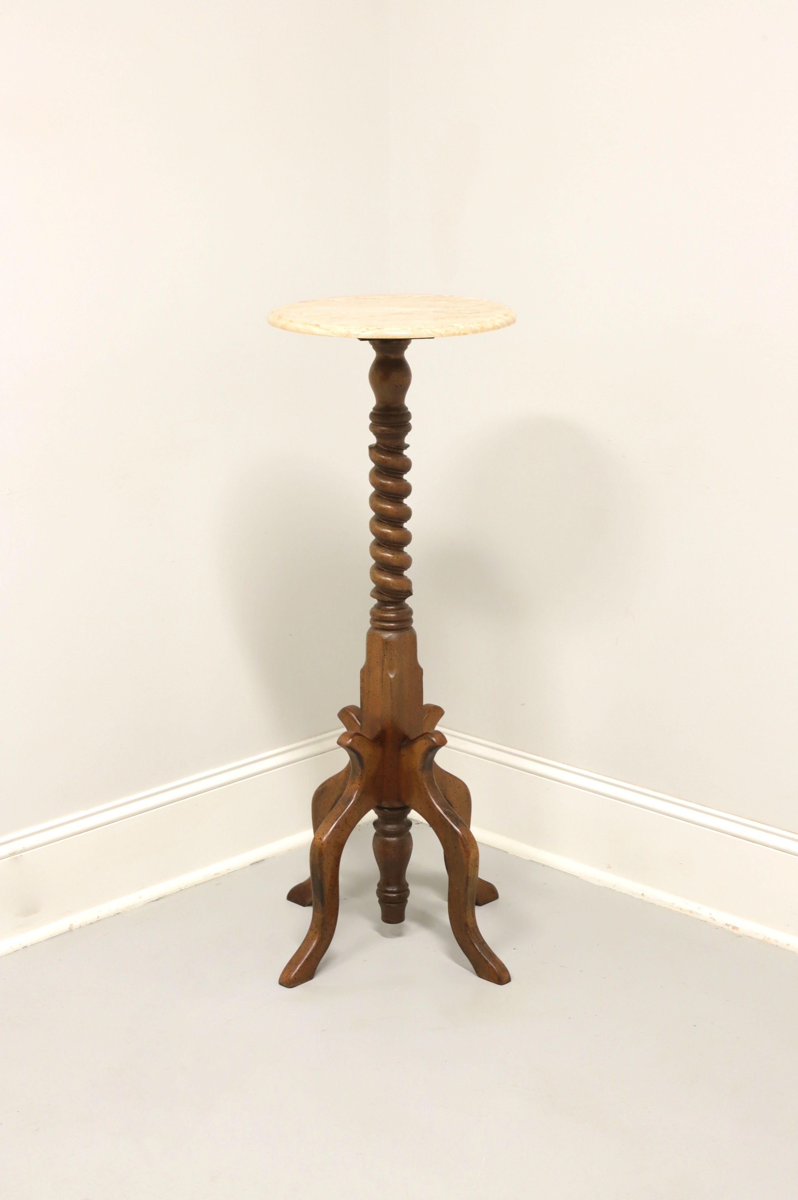A Victorian style plant stand, unbranded. Solid walnut with distressed finish to give appearance of age, round cultured marble bevel edge top, tall barley twist pedestal base, decorative reverse finial at bottom, and four curved legs. Cultured