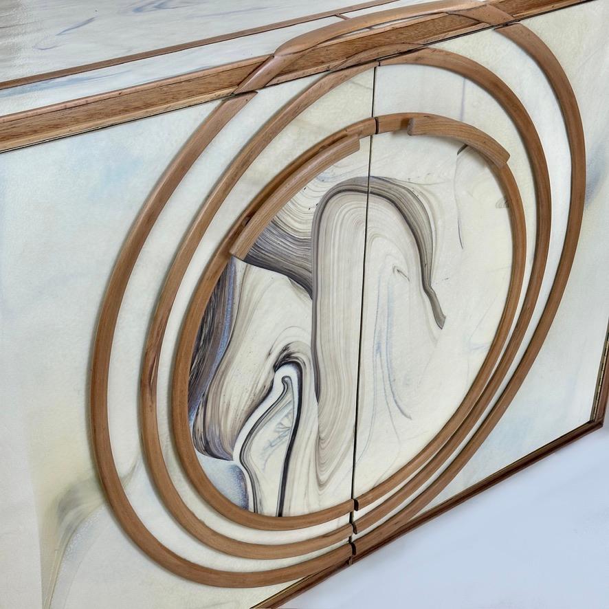 Magnificient white textured Murano art glass (with touches of blue and brown) & beech wood with brass details cabinet. One central and removable wood shelf inside. Solid beech wood handles to pull open the two cabinet doors. All the wood finishings