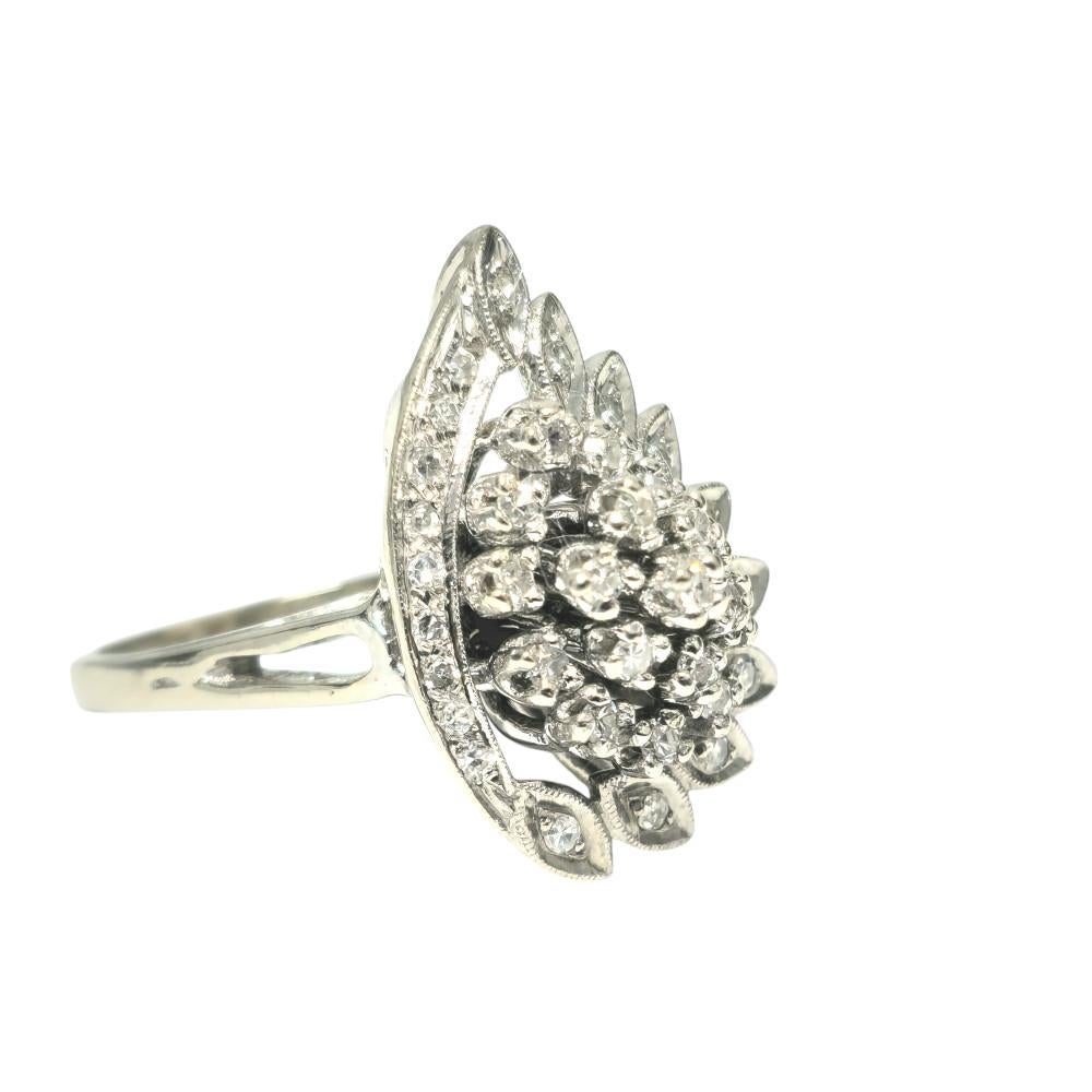 Step into a world of timeless beauty with this vintage-inspired 14k white gold ring. Adorned with a total of 1.92 carats of round single-cut diamonds, this ring exudes elegance and sophistication. The diamonds boast SI2 clarity and H color, ensuring