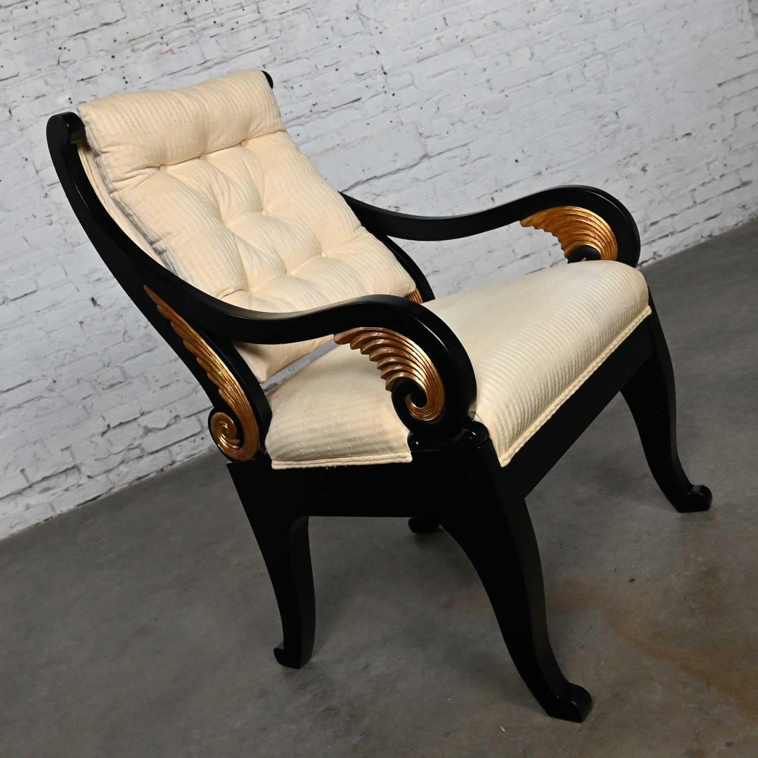Fabulous vintage neoclassic revival side chair with a black painted frame, gilt wing accents and off-white upholstery fabric. Beautiful condition, keeping in mind that this is vintage and not new so will have signs of use and wear. The frame has